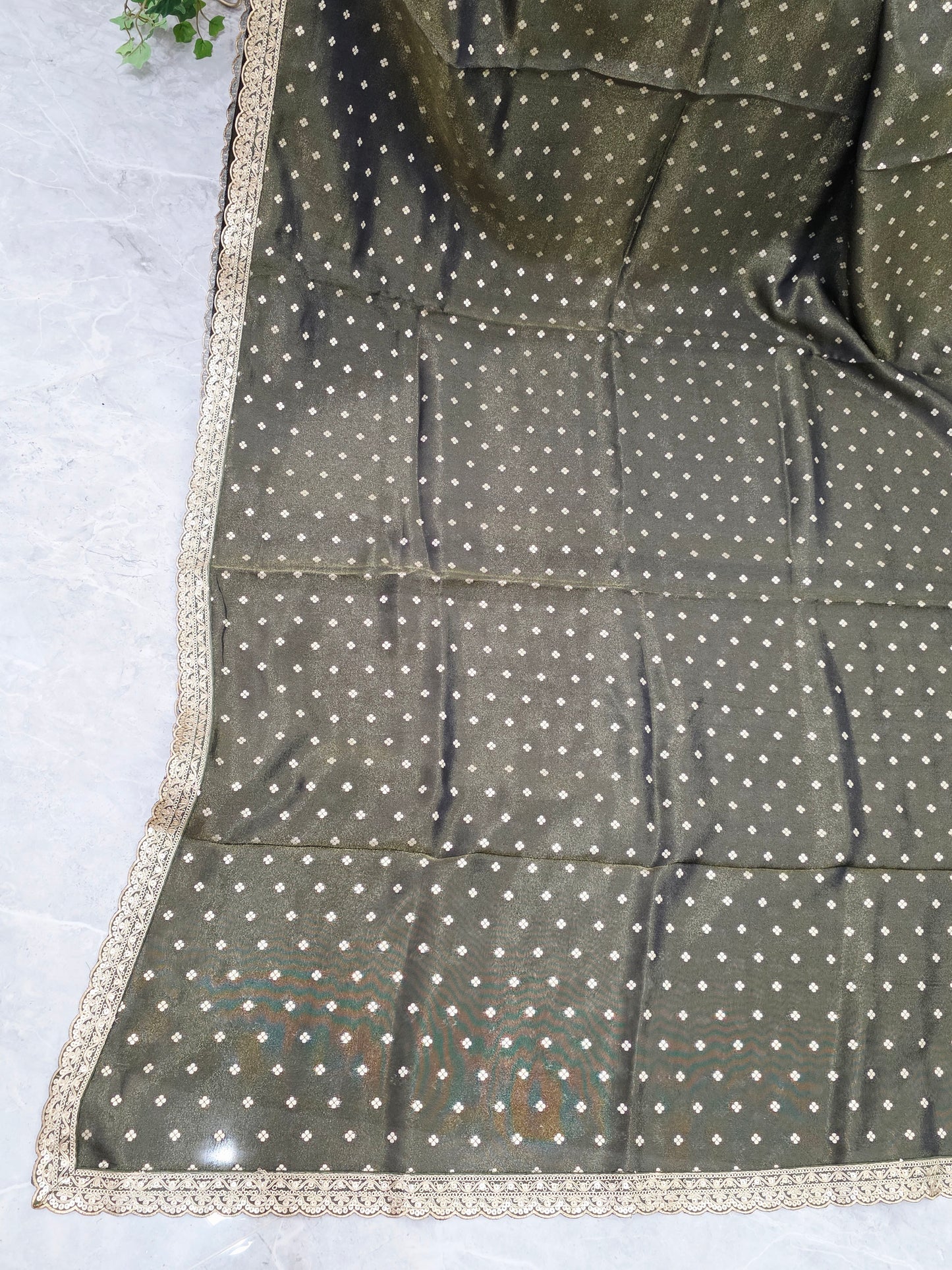 Luxury olive gold tissue saree with delicate all over butta and lace border
