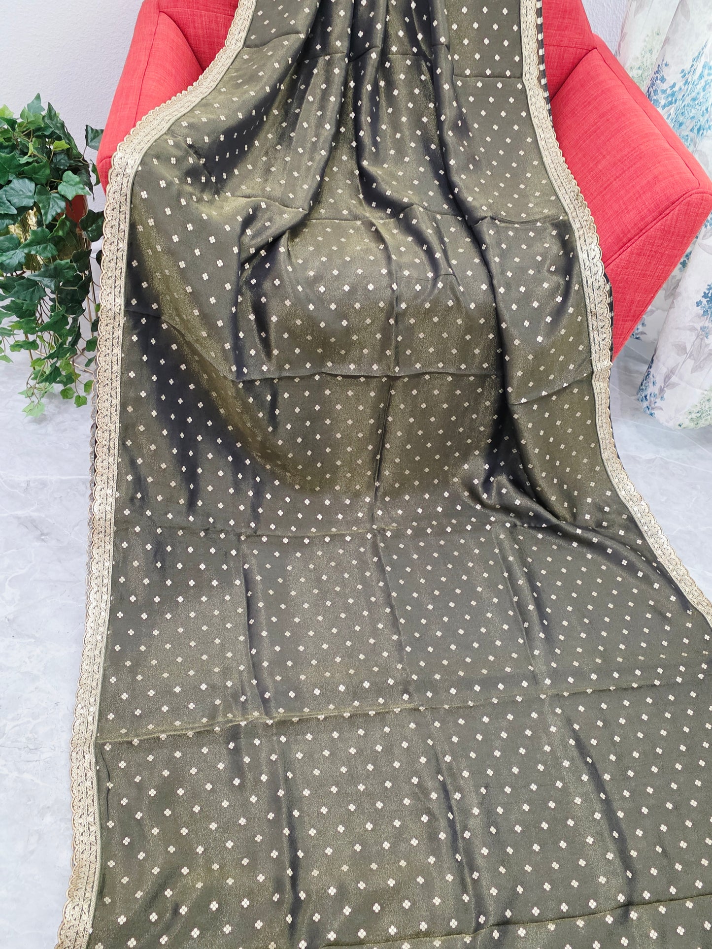 Luxury olive gold tissue saree with delicate all over butta and lace border