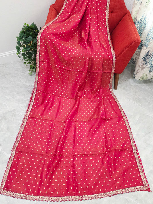 Ruby Reddish Pink Tissue Saree with delicate all over butta and lace border