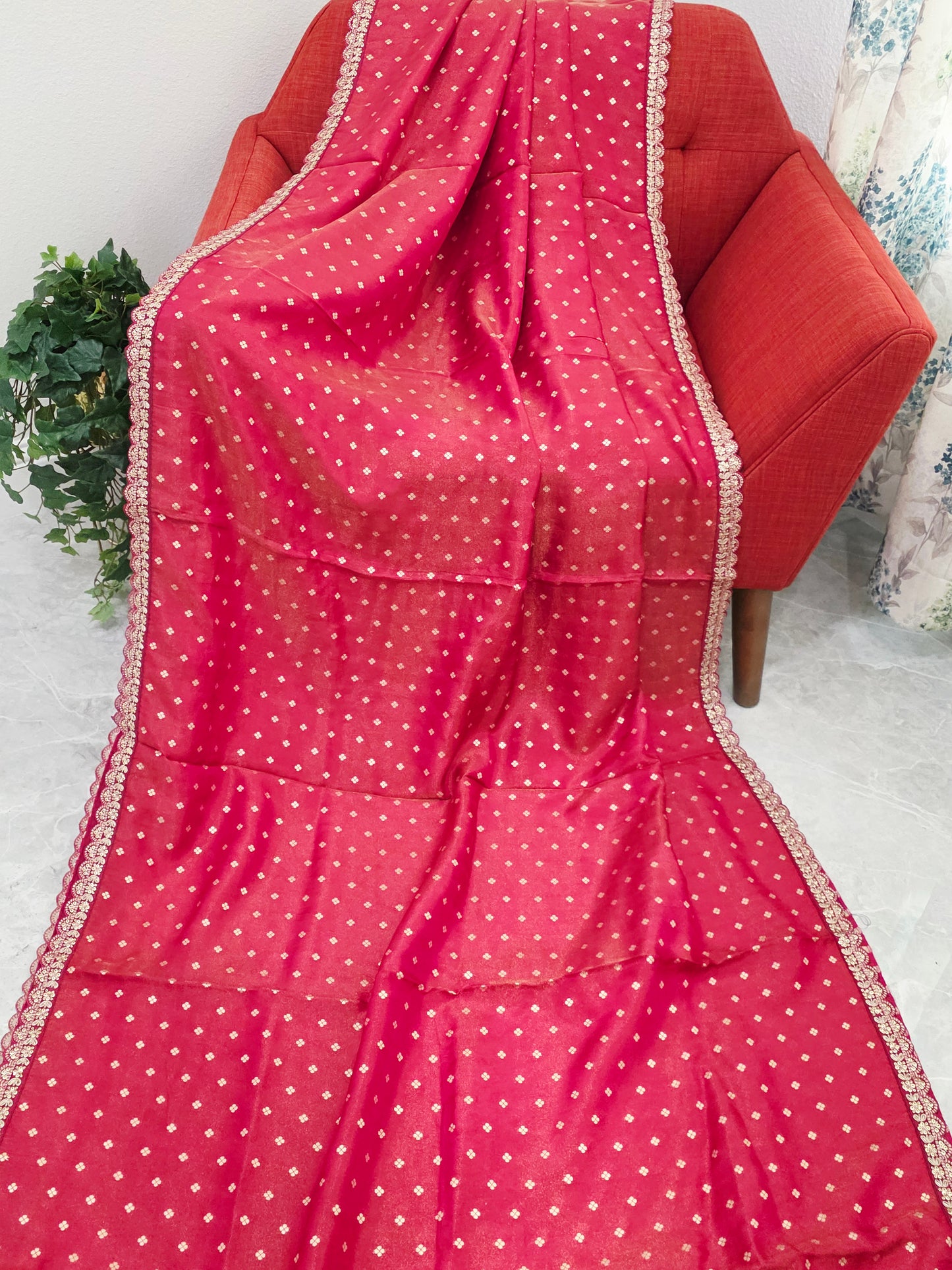 Ruby Reddish Pink Tissue Saree with delicate all over butta and lace border