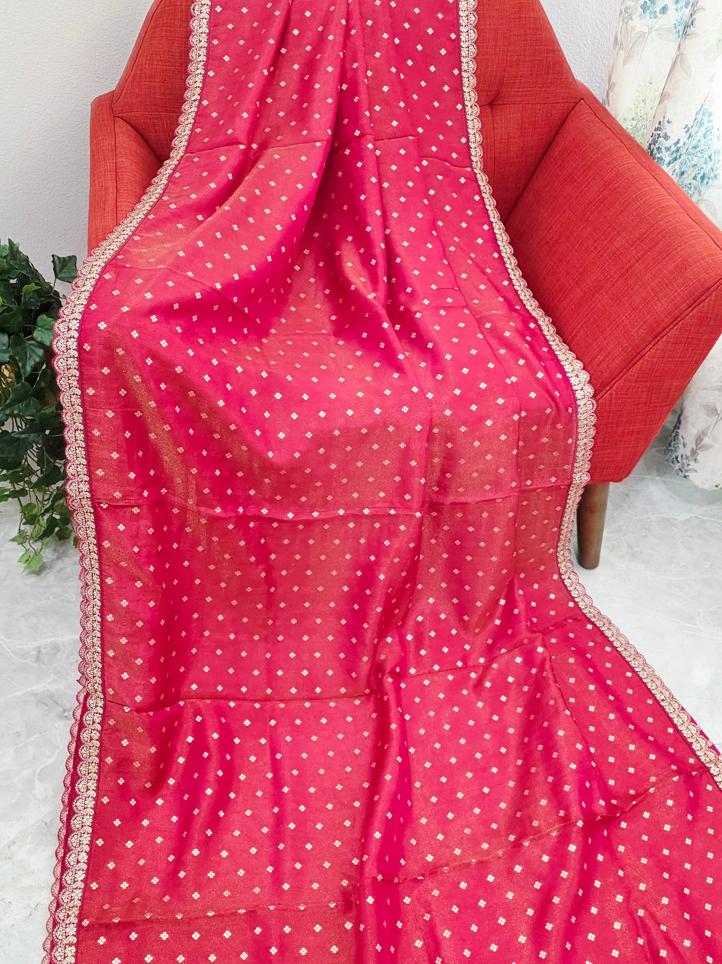 Ruby Reddish Pink Tissue Saree with delicate all over butta and lace border