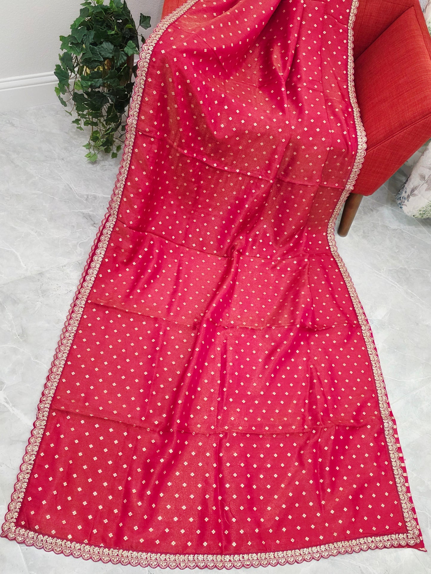 Ruby Reddish Pink Tissue Saree with delicate all over butta and lace border