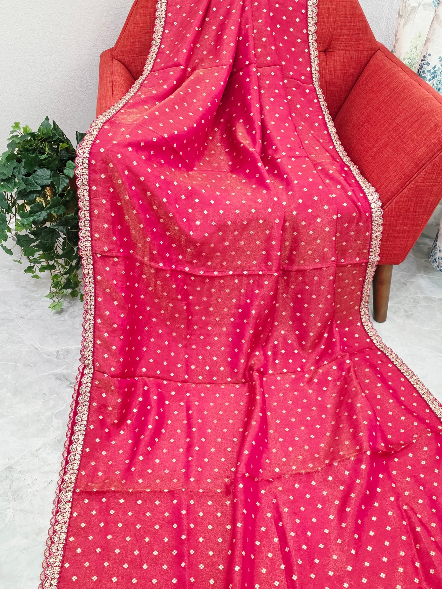 Ruby Reddish Pink Tissue Saree with delicate all over butta and lace border