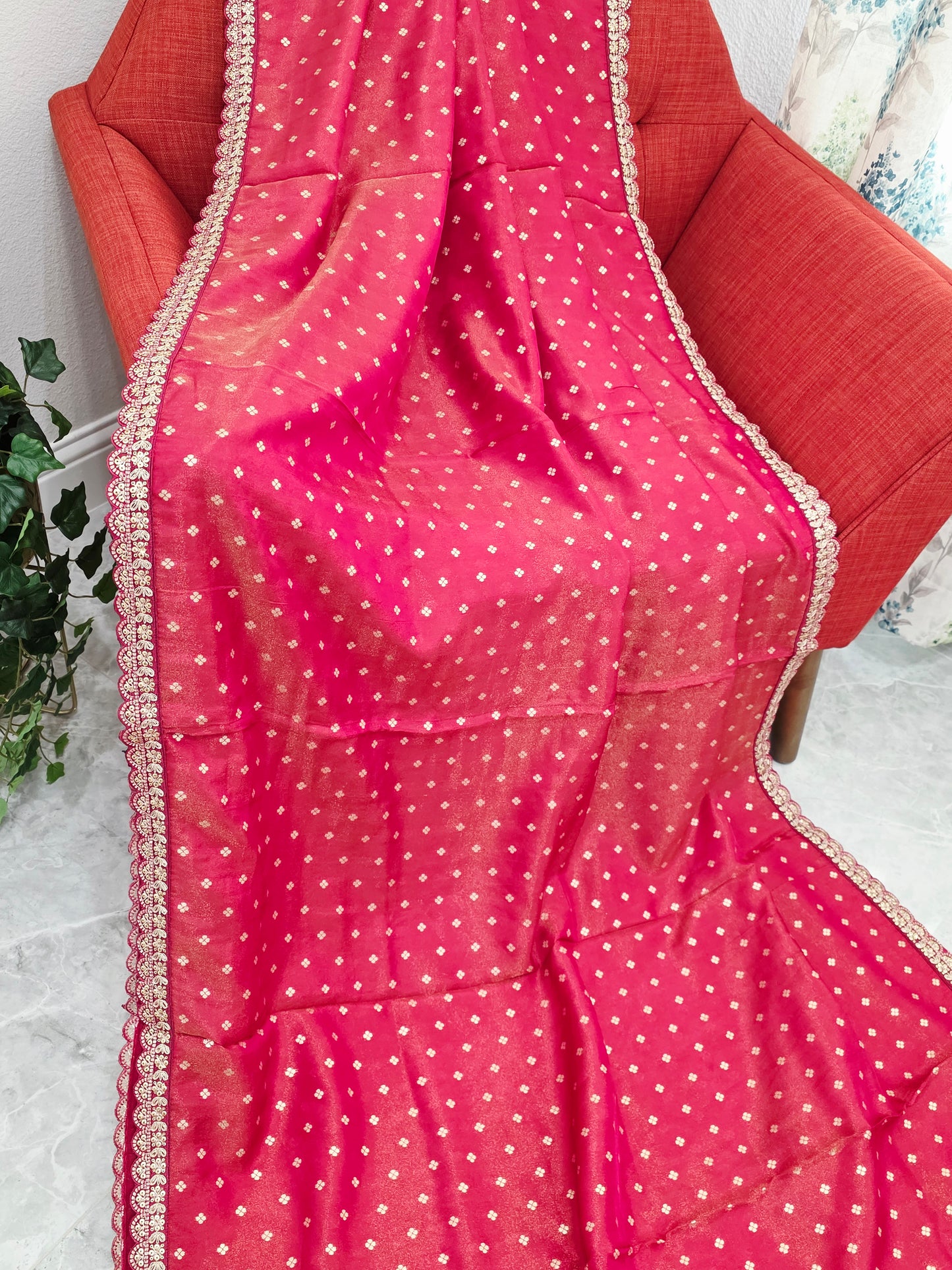 Ruby Reddish Pink Tissue Saree with delicate all over butta and lace border