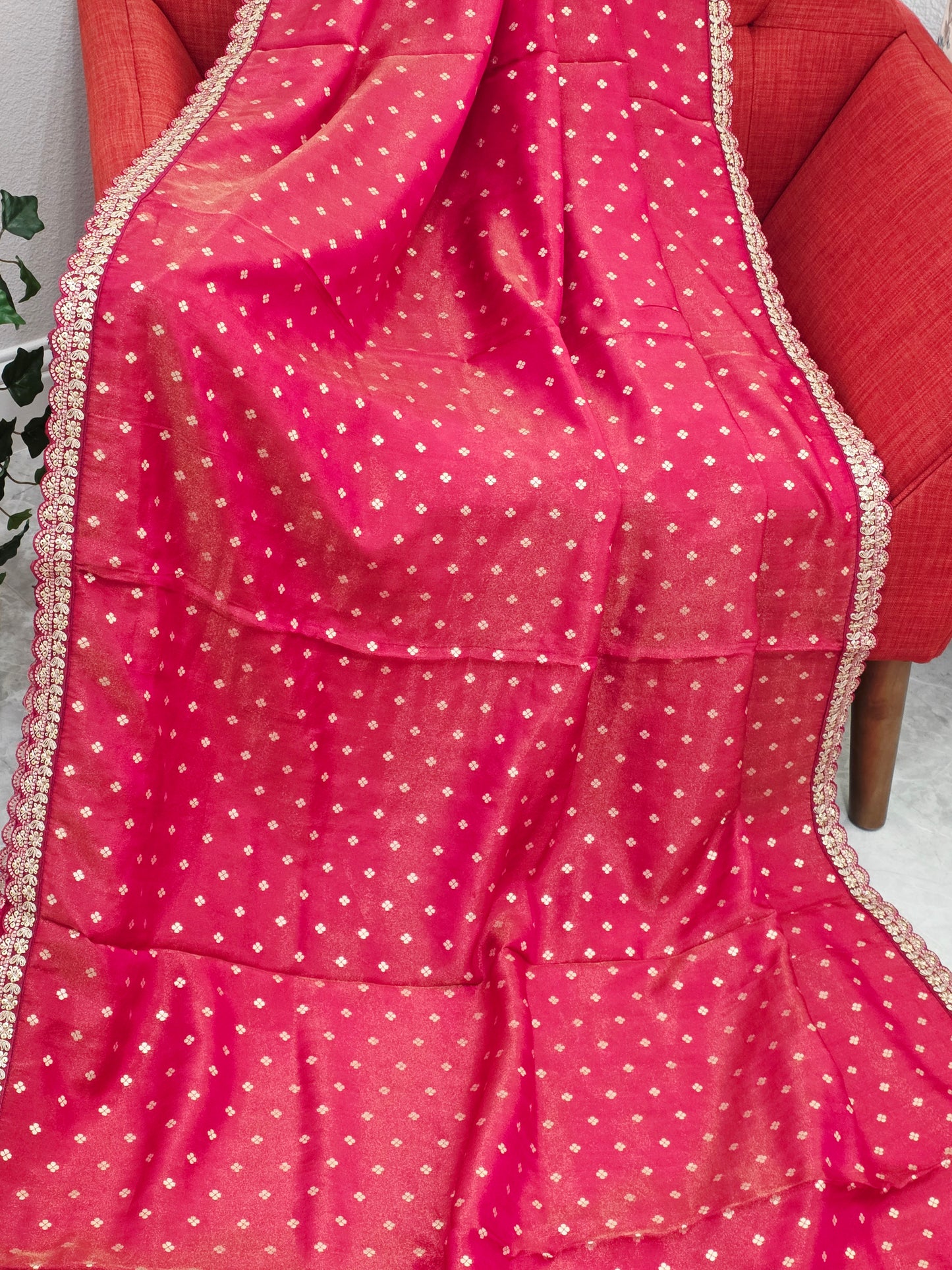 Ruby Reddish Pink Tissue Saree with delicate all over butta and lace border