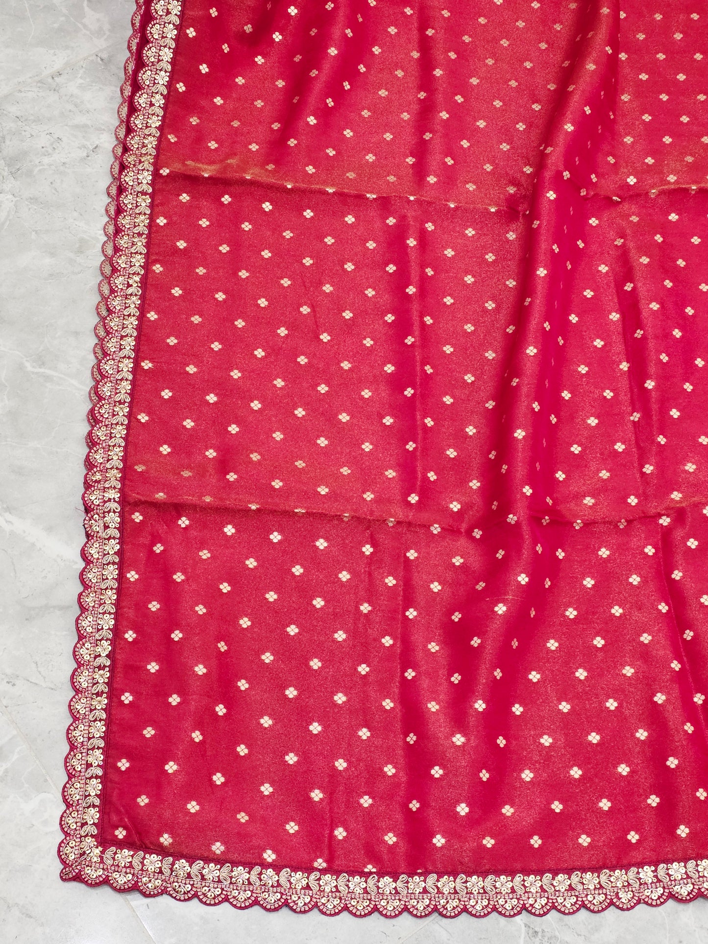 Ruby Reddish Pink Tissue Saree with delicate all over butta and lace border