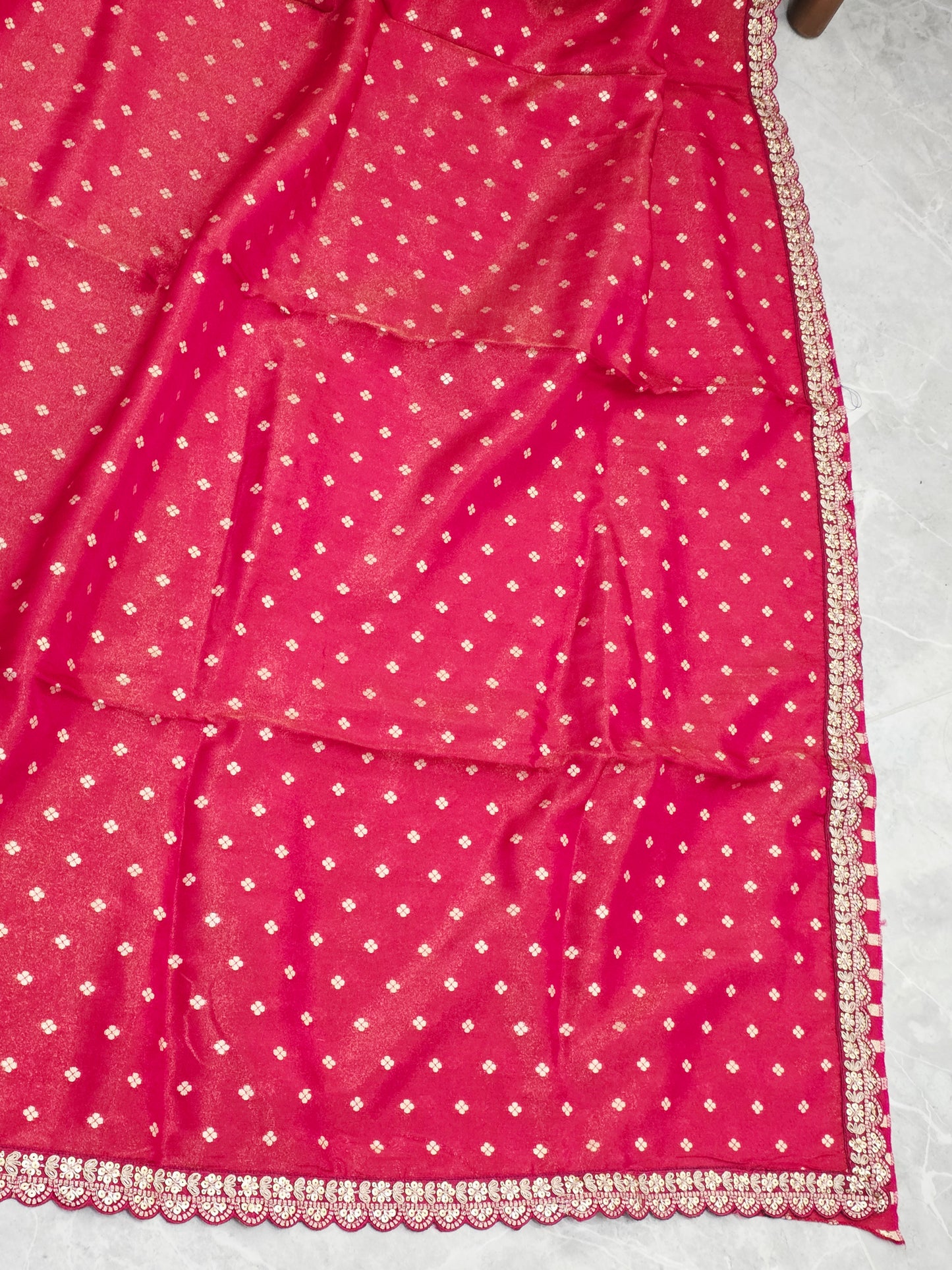 Ruby Reddish Pink Tissue Saree with delicate all over butta and lace border