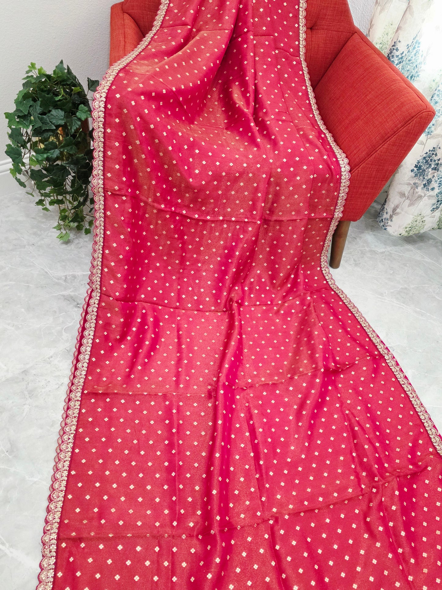 Ruby Reddish Pink Tissue Saree with delicate all over butta and lace border