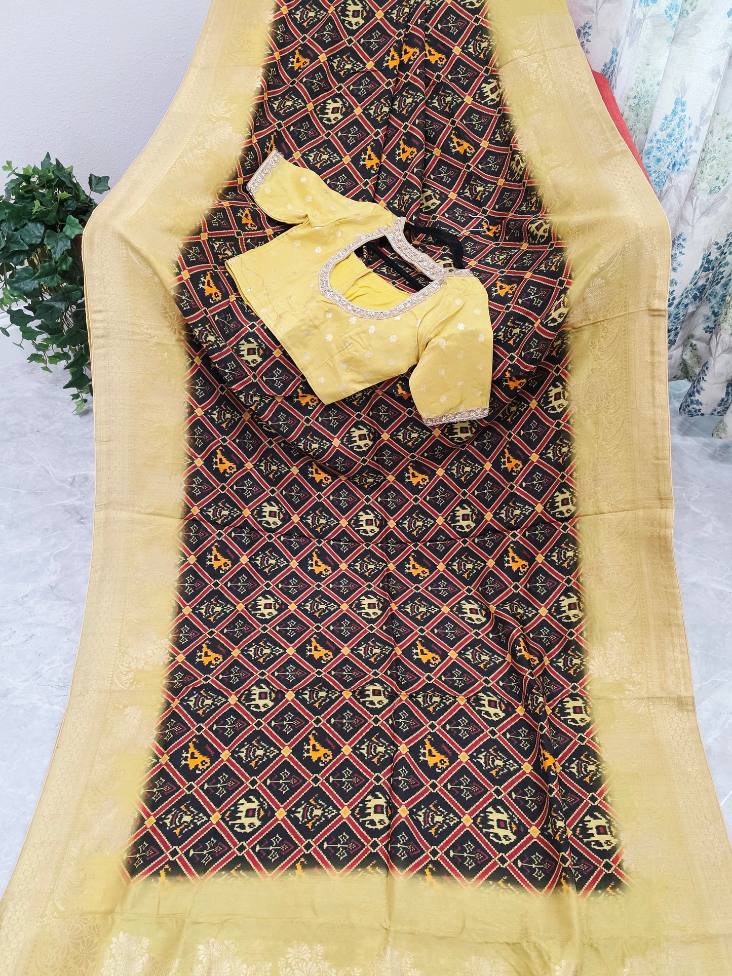Royal Noir Patola Print Silk Saree with Antique Lime Gold Border & Stitched Blouse