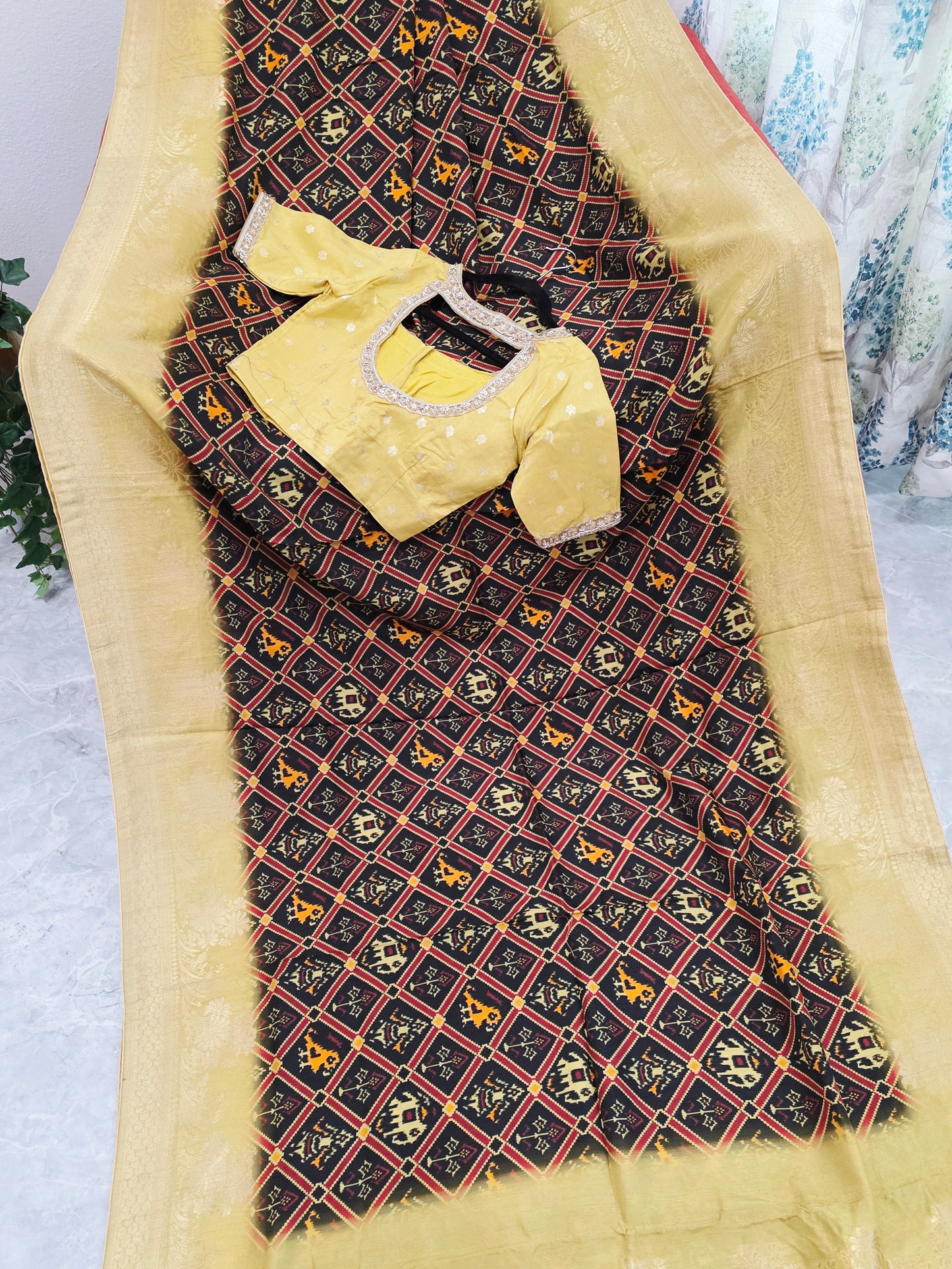 Royal Noir Patola Print Silk Saree with Antique Lime Gold Border & Stitched Blouse