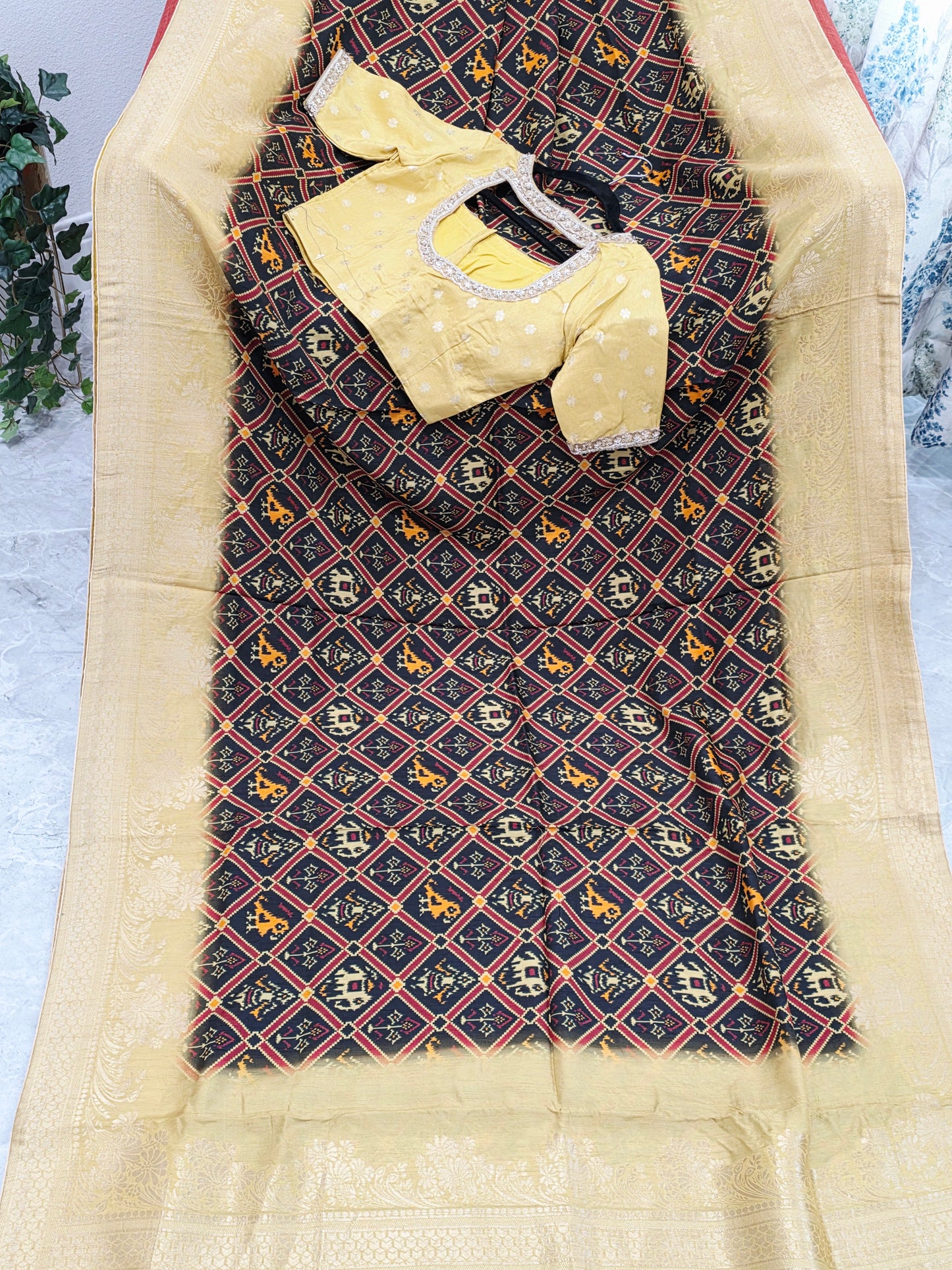 Royal Noir Patola Print Silk Saree with Antique Lime Gold Border & Stitched Blouse