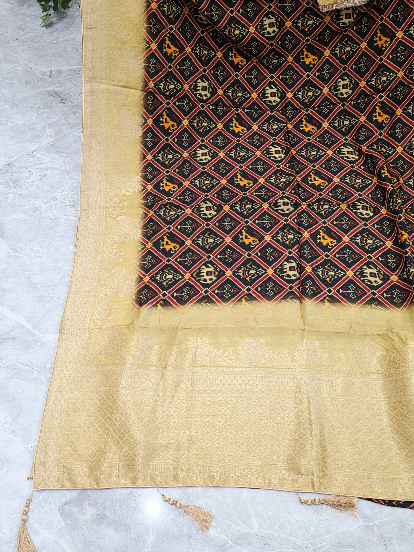 Royal Noir Patola Print Silk Saree with Antique Lime Gold Border & Stitched Blouse