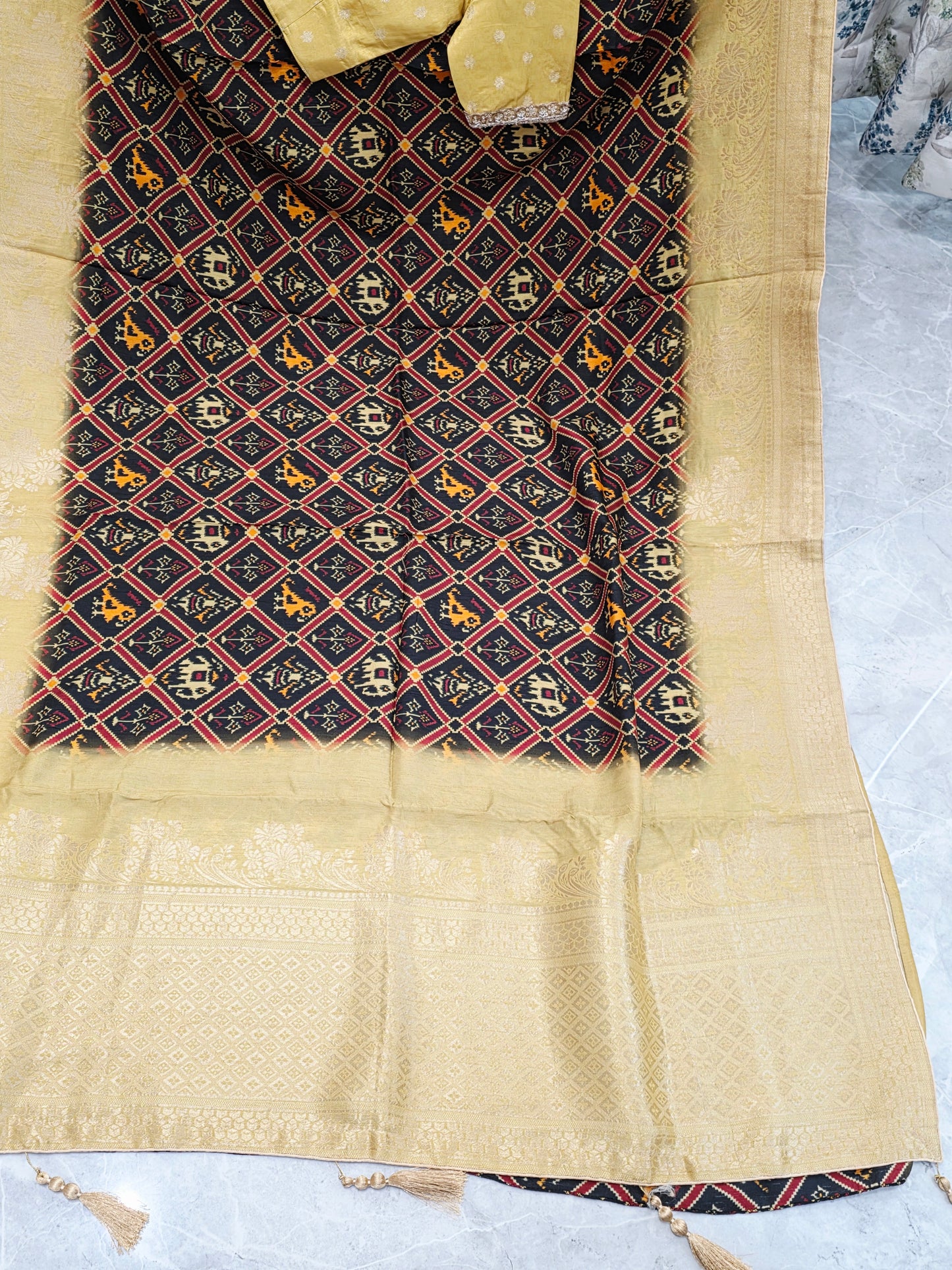 Royal Noir Patola Print Silk Saree with Antique Lime Gold Border & Stitched Blouse