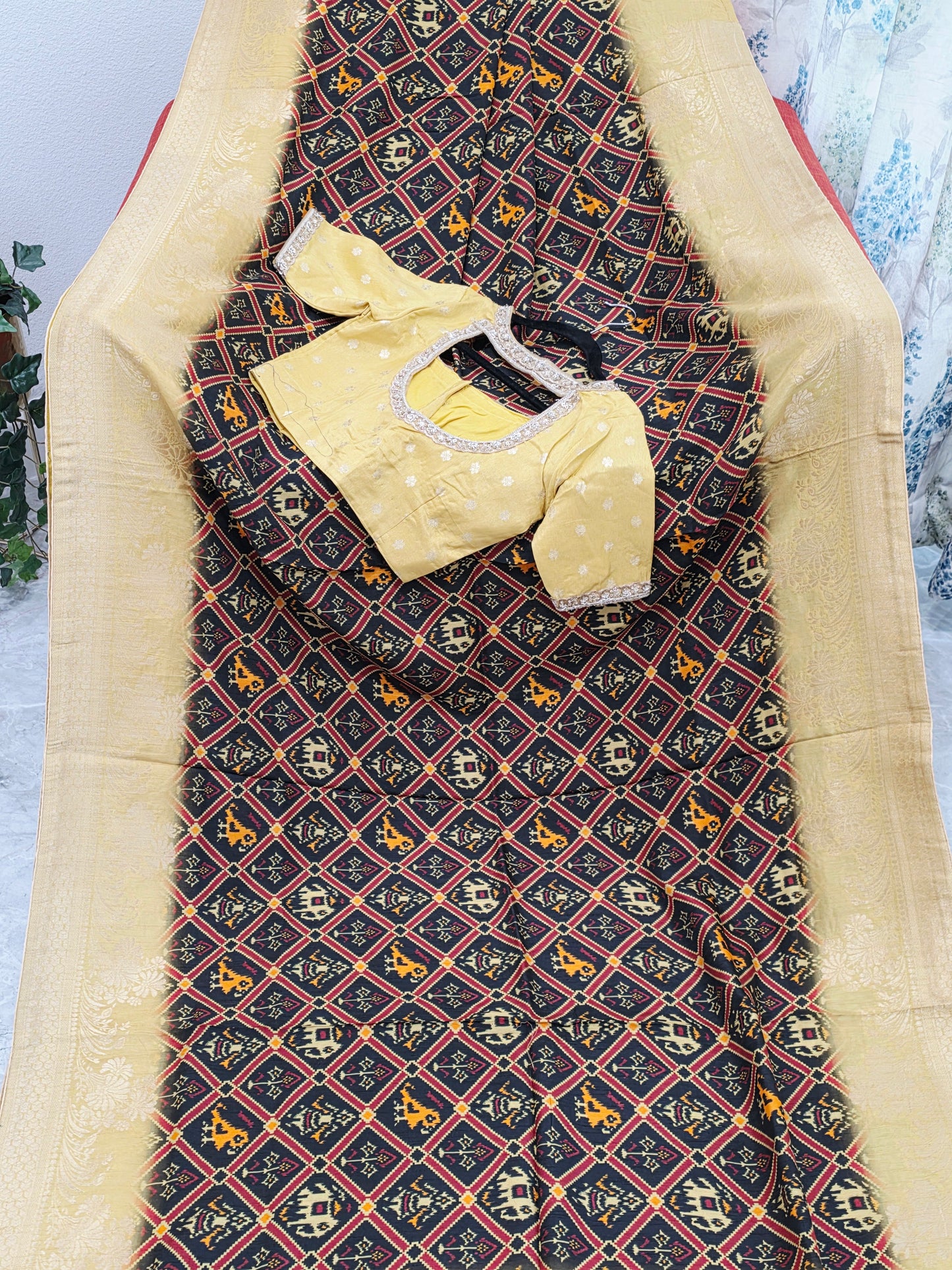 Royal Noir Patola Print Silk Saree with Antique Lime Gold Border & Stitched Blouse
