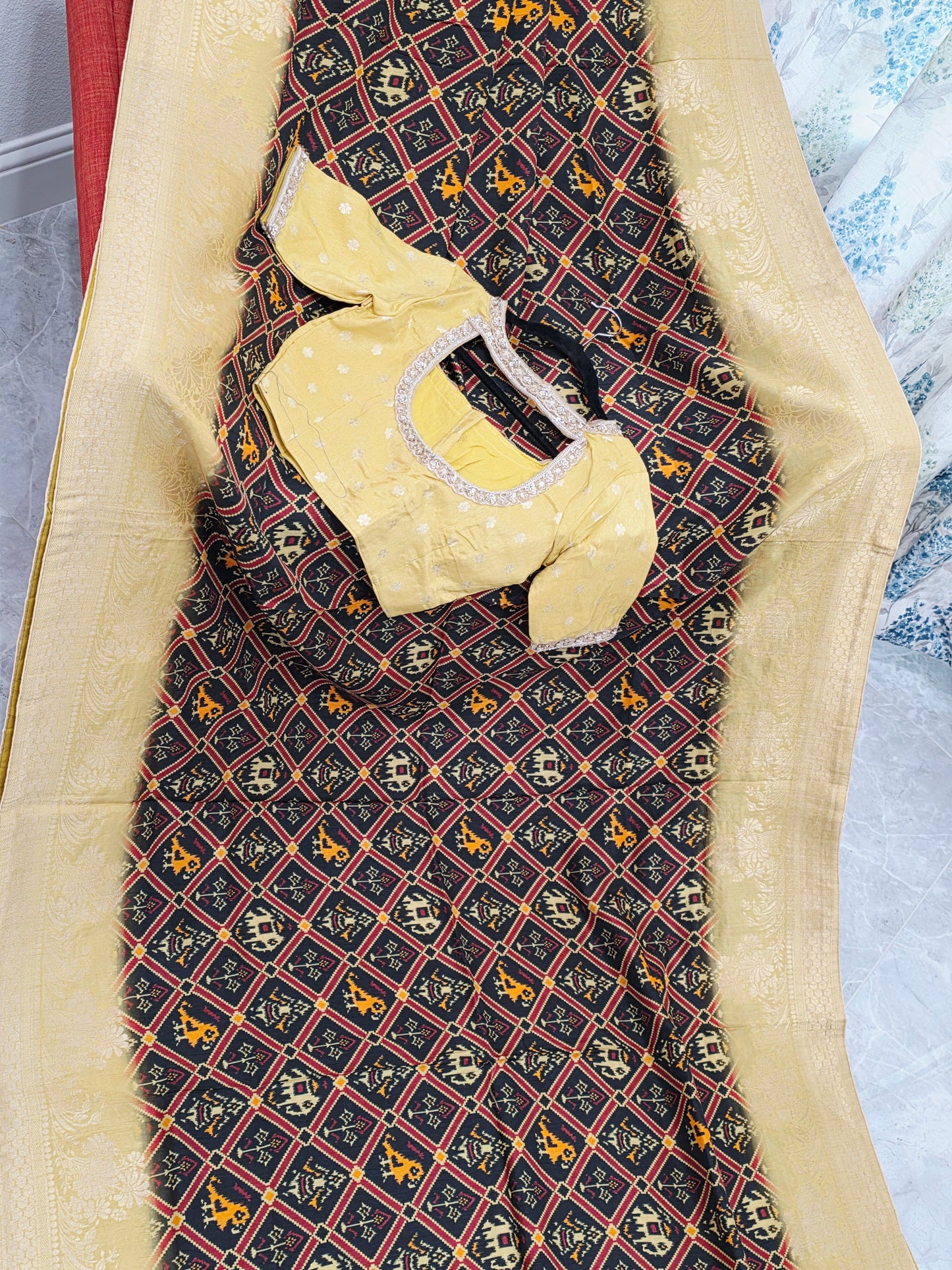 Royal Noir Patola Print Silk Saree with Antique Lime Gold Border & Stitched Blouse