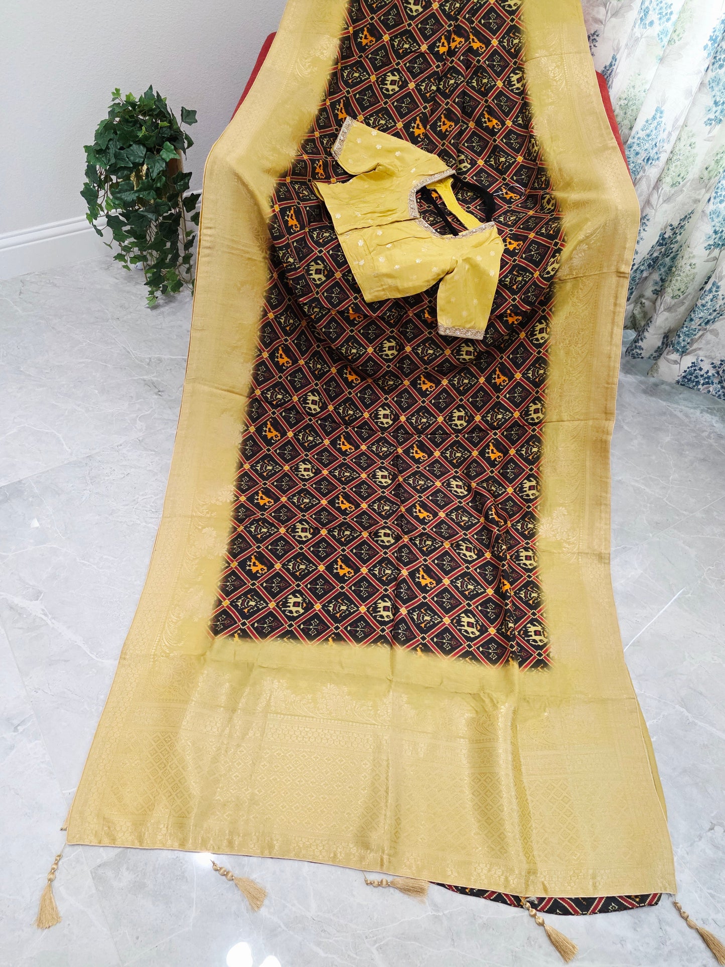 Royal Noir Patola Print Silk Saree with Antique Lime Gold Border & Stitched Blouse