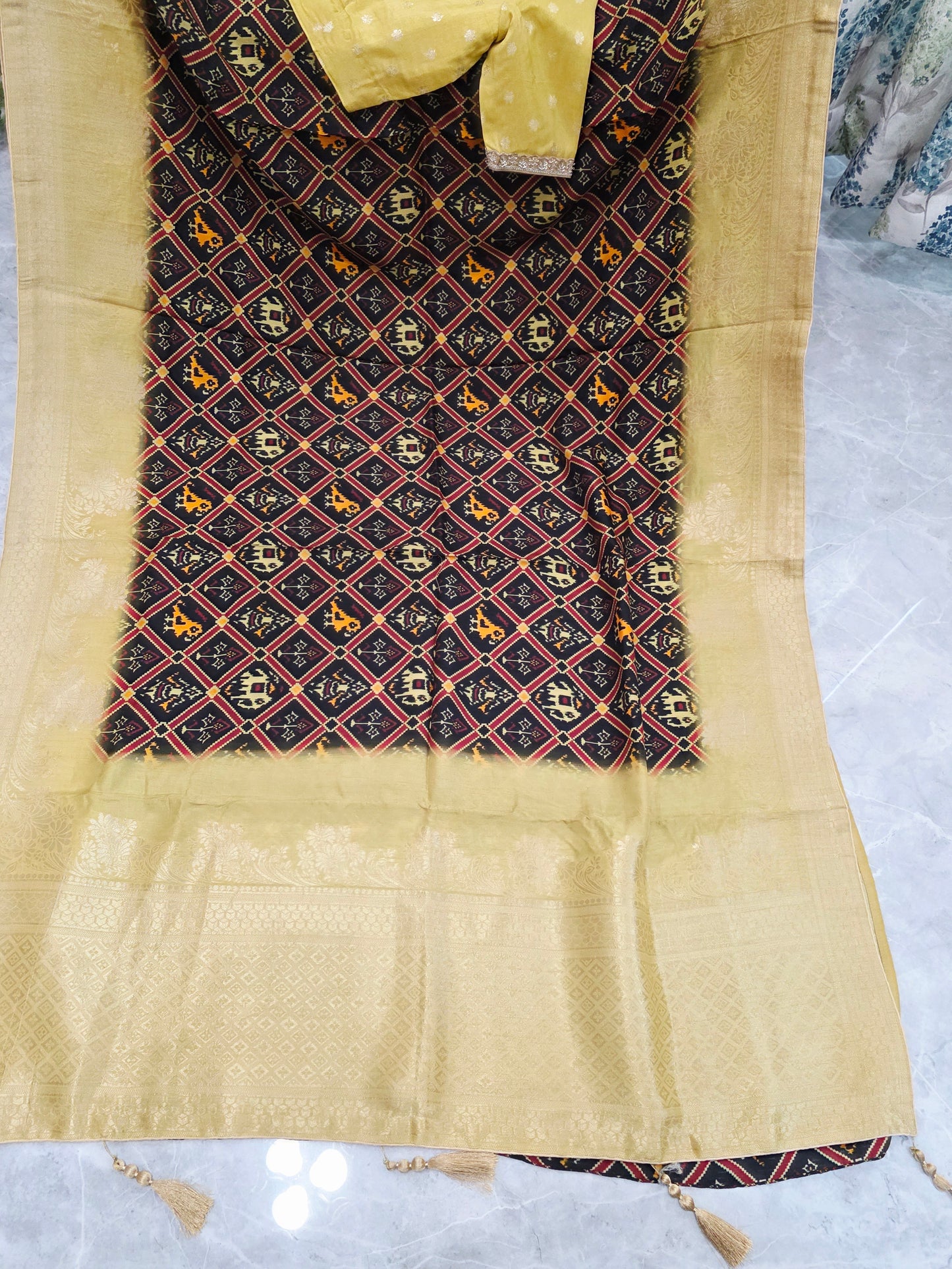 Royal Noir Patola Print Silk Saree with Antique Lime Gold Border & Stitched Blouse
