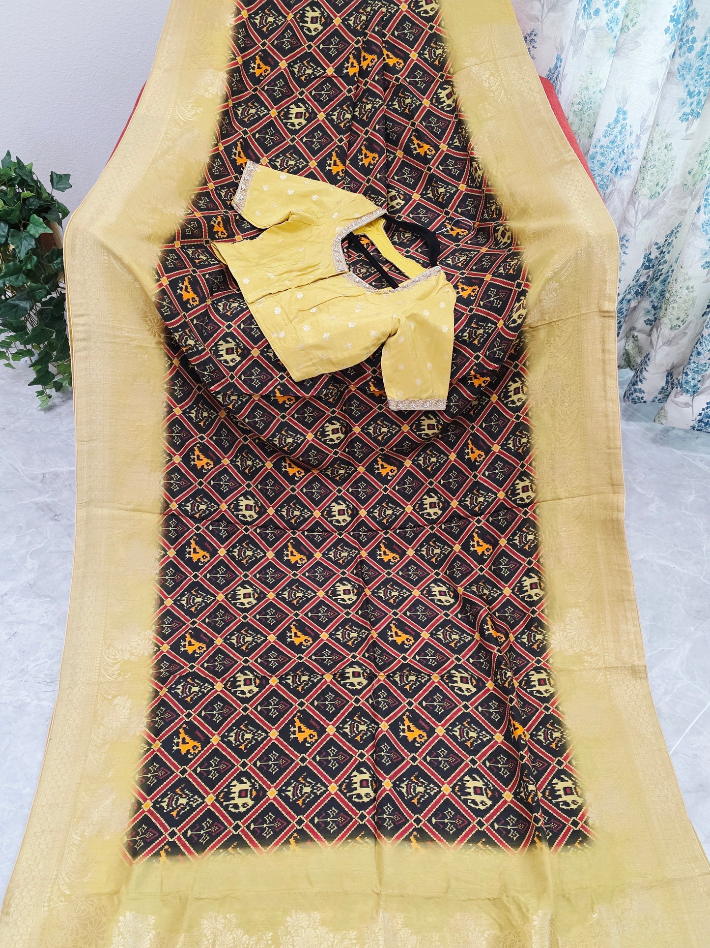 Royal Noir Patola Print Silk Saree with Antique Lime Gold Border & Stitched Blouse
