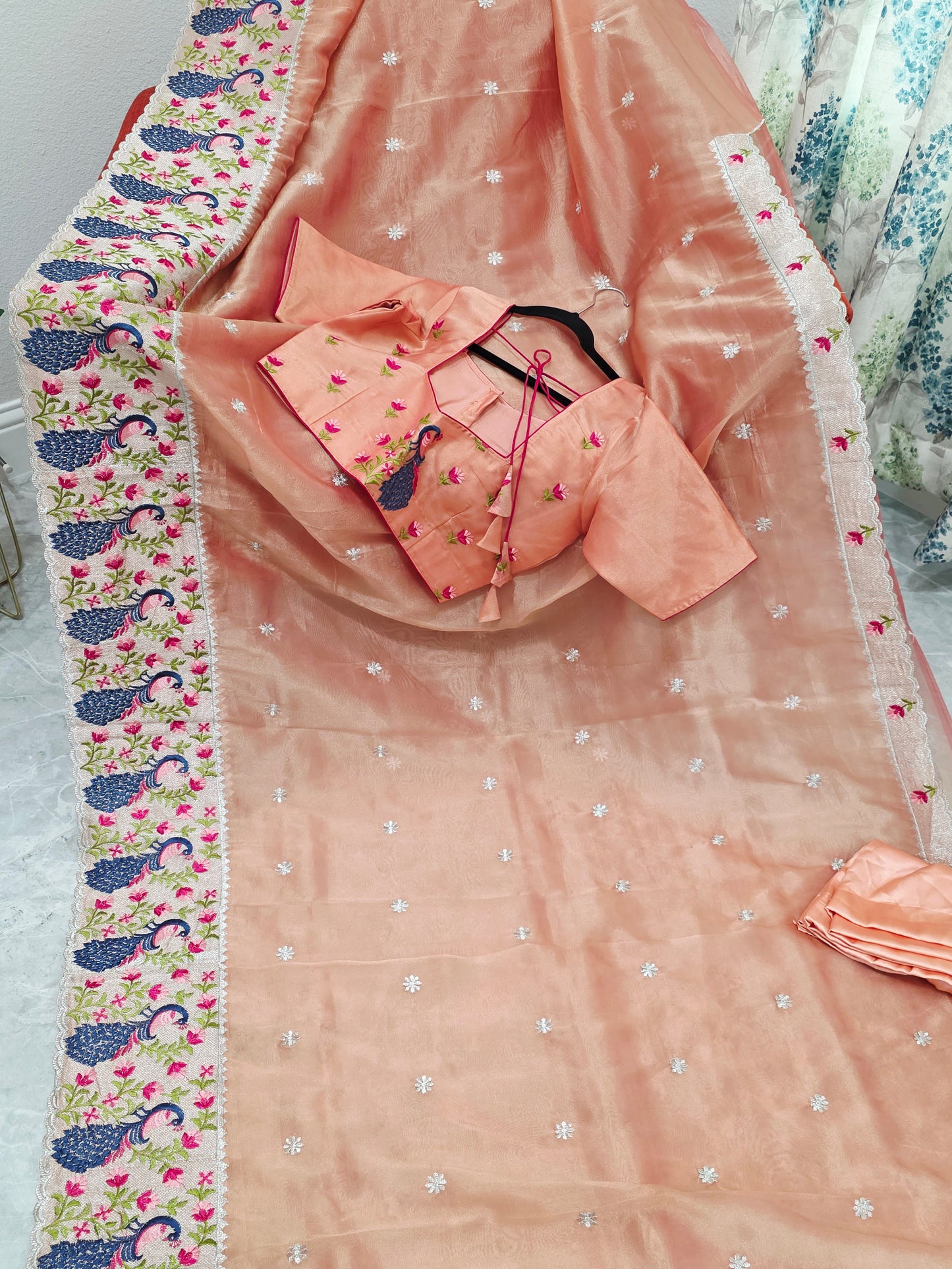 Peach Coral Tissue Saree with Peacock Embroidered Border, Stitched Blouse & Satin Petticoat