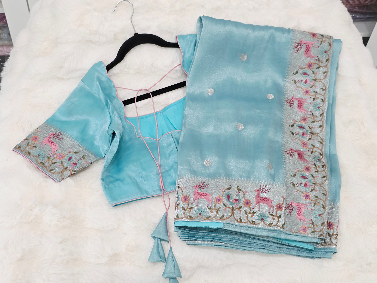 Aqua Blue Soft Tissue Silk Saree with Embroidered Border & Stitched Blouse