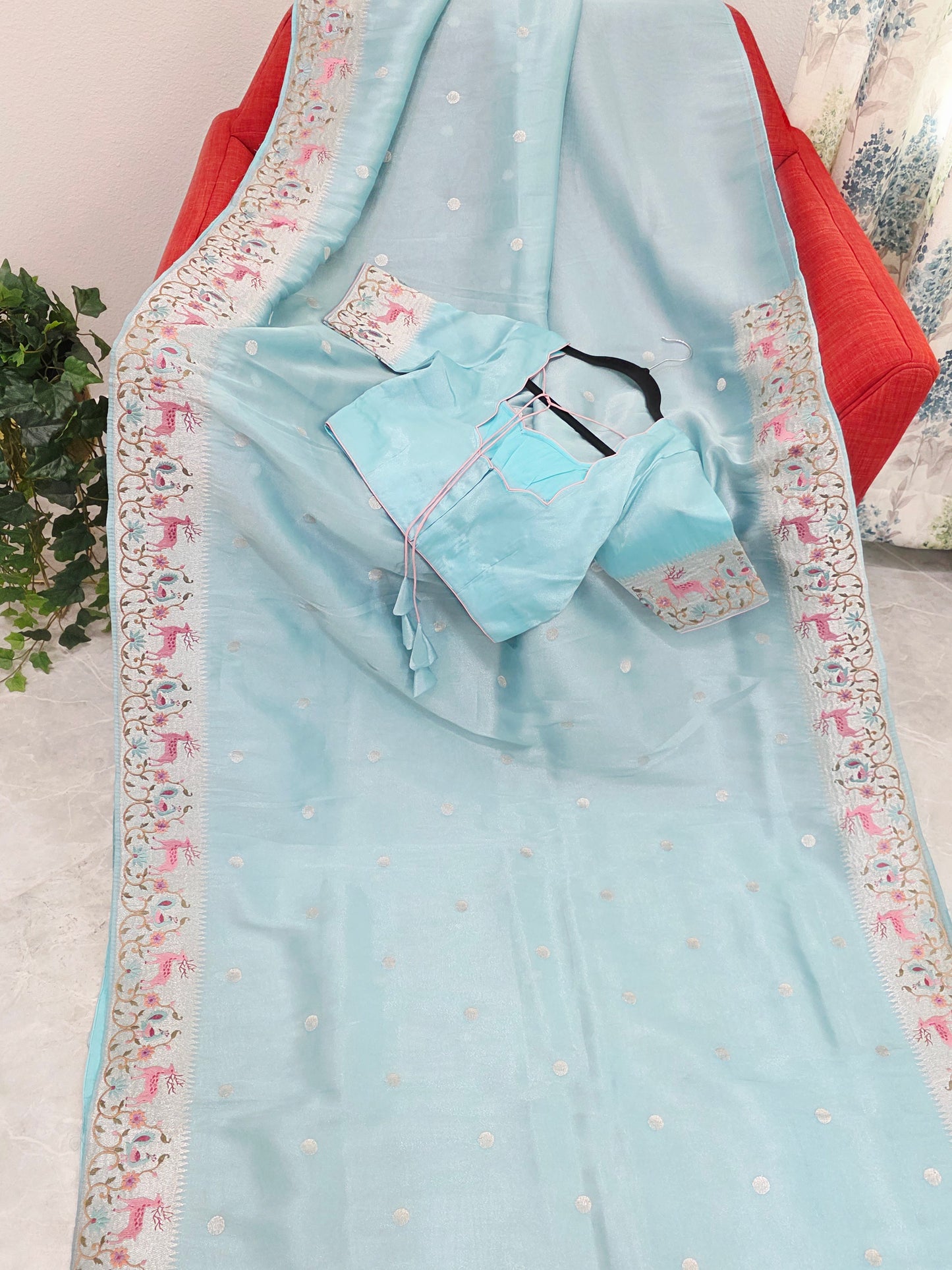 Aqua Blue Soft Tissue Silk Saree with Embroidered Border & Stitched Blouse