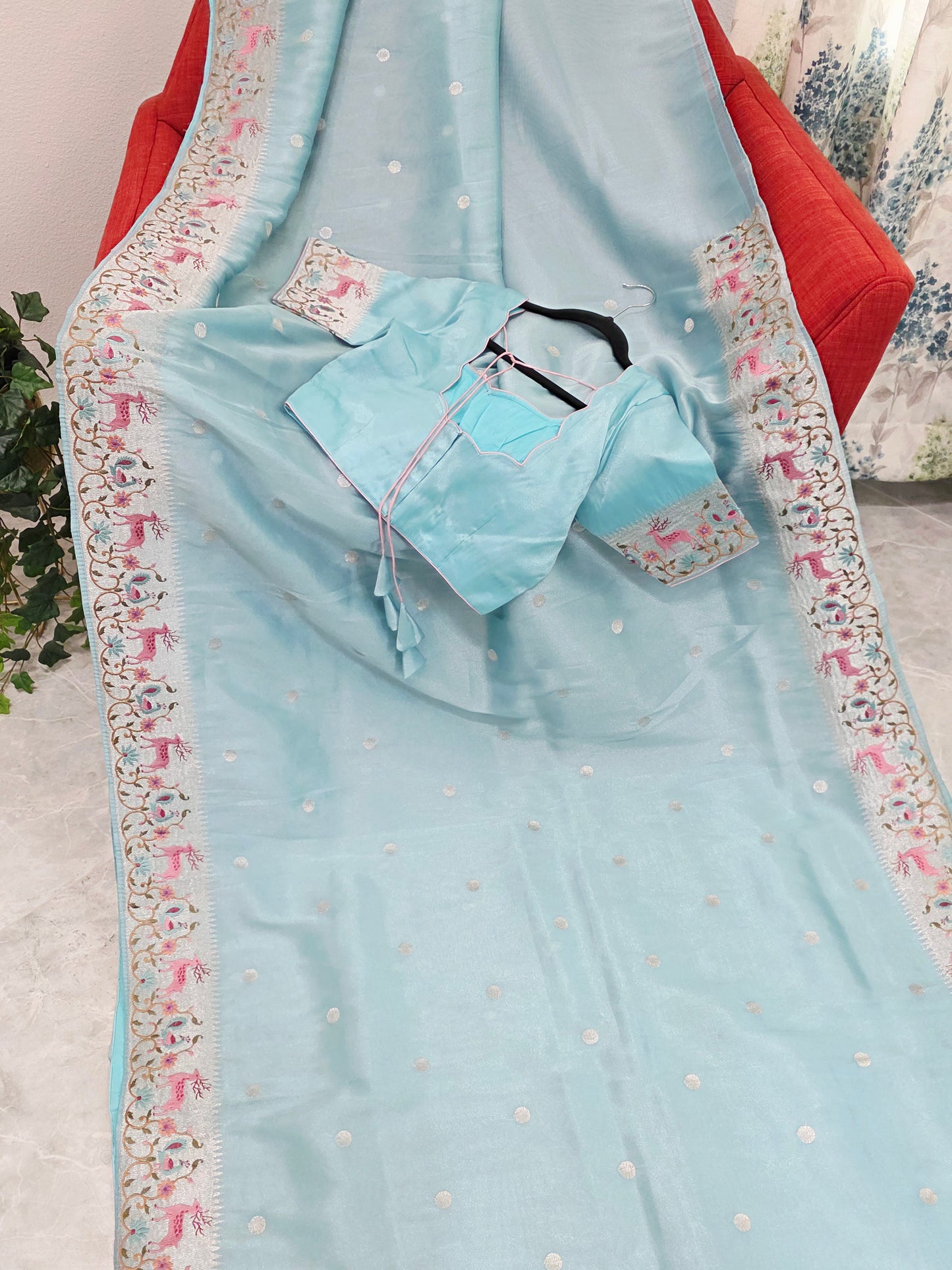 Aqua Blue Soft Tissue Silk Saree with Embroidered Border & Stitched Blouse