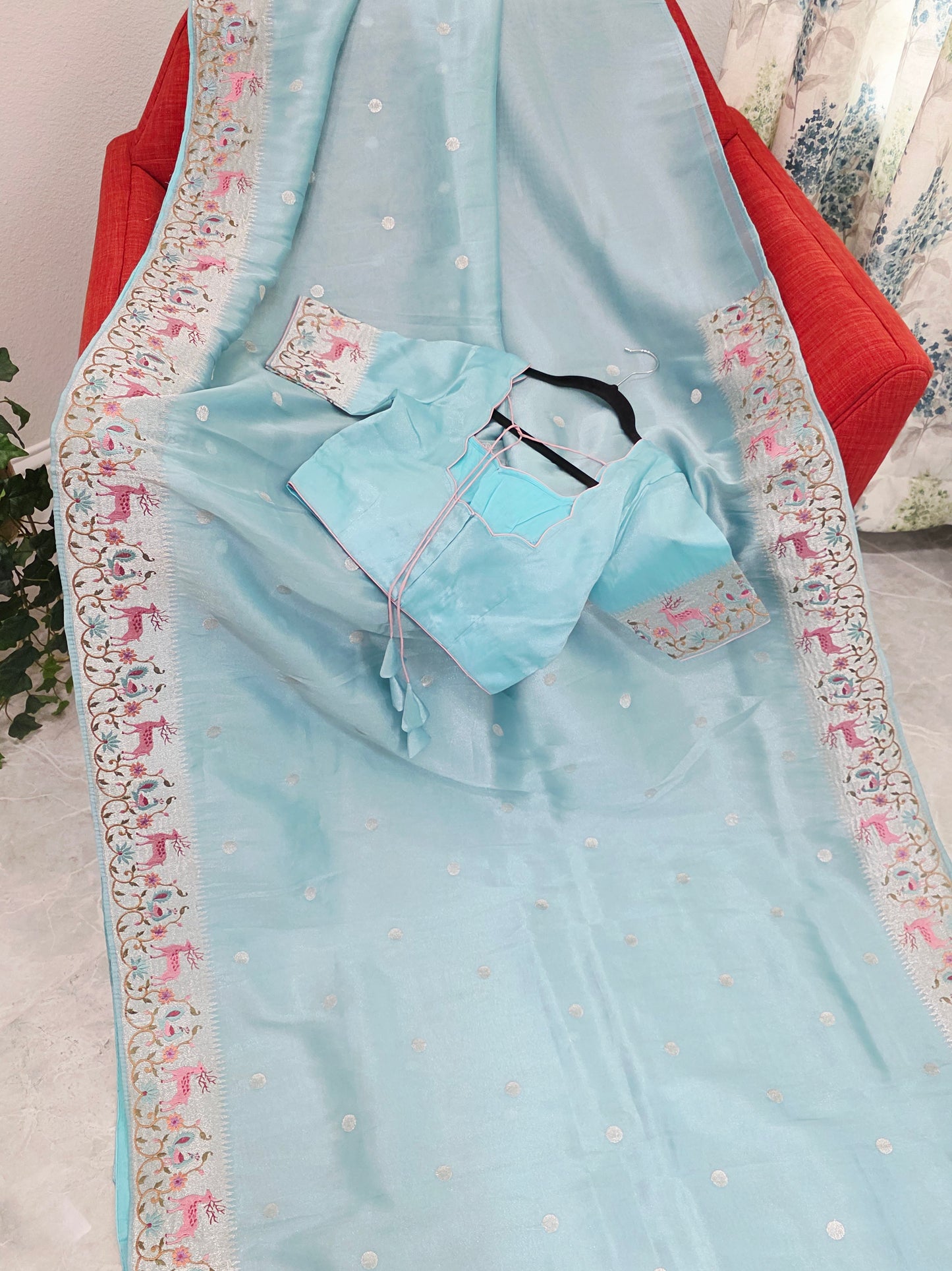 Aqua Blue Soft Tissue Silk Saree with Embroidered Border & Stitched Blouse