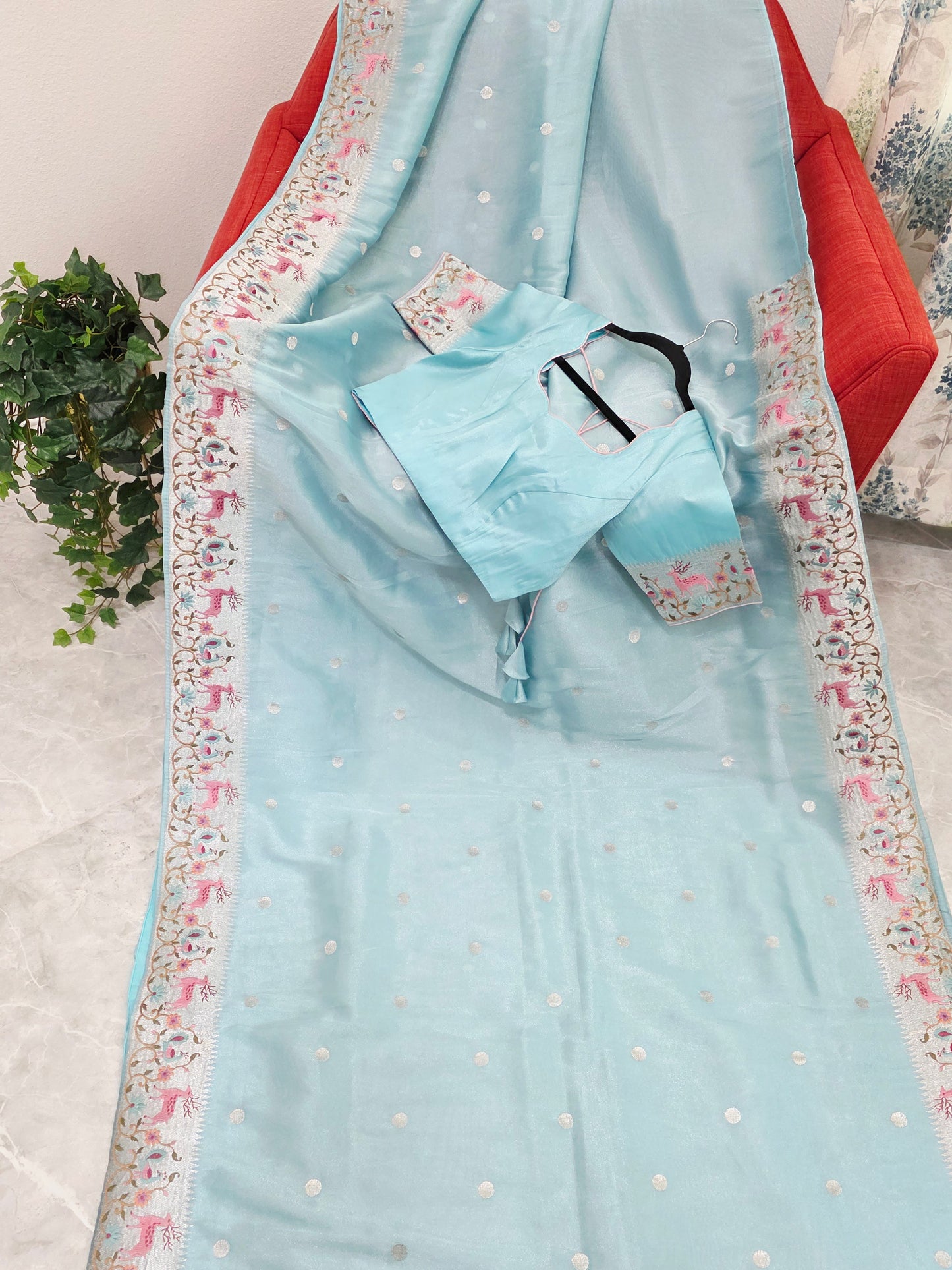Aqua Blue Soft Tissue Silk Saree with Embroidered Border & Stitched Blouse