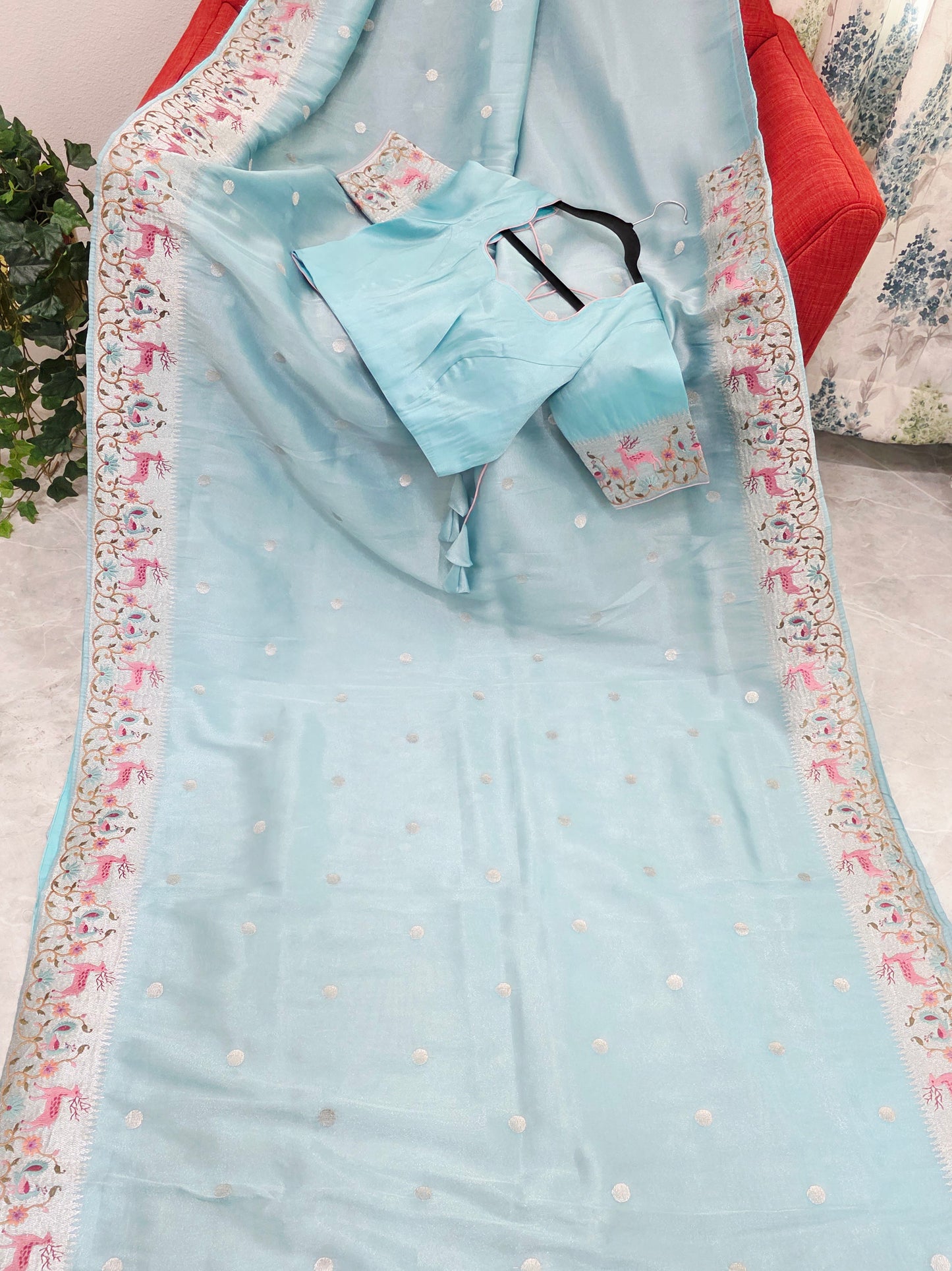 Aqua Blue Soft Tissue Silk Saree with Embroidered Border & Stitched Blouse