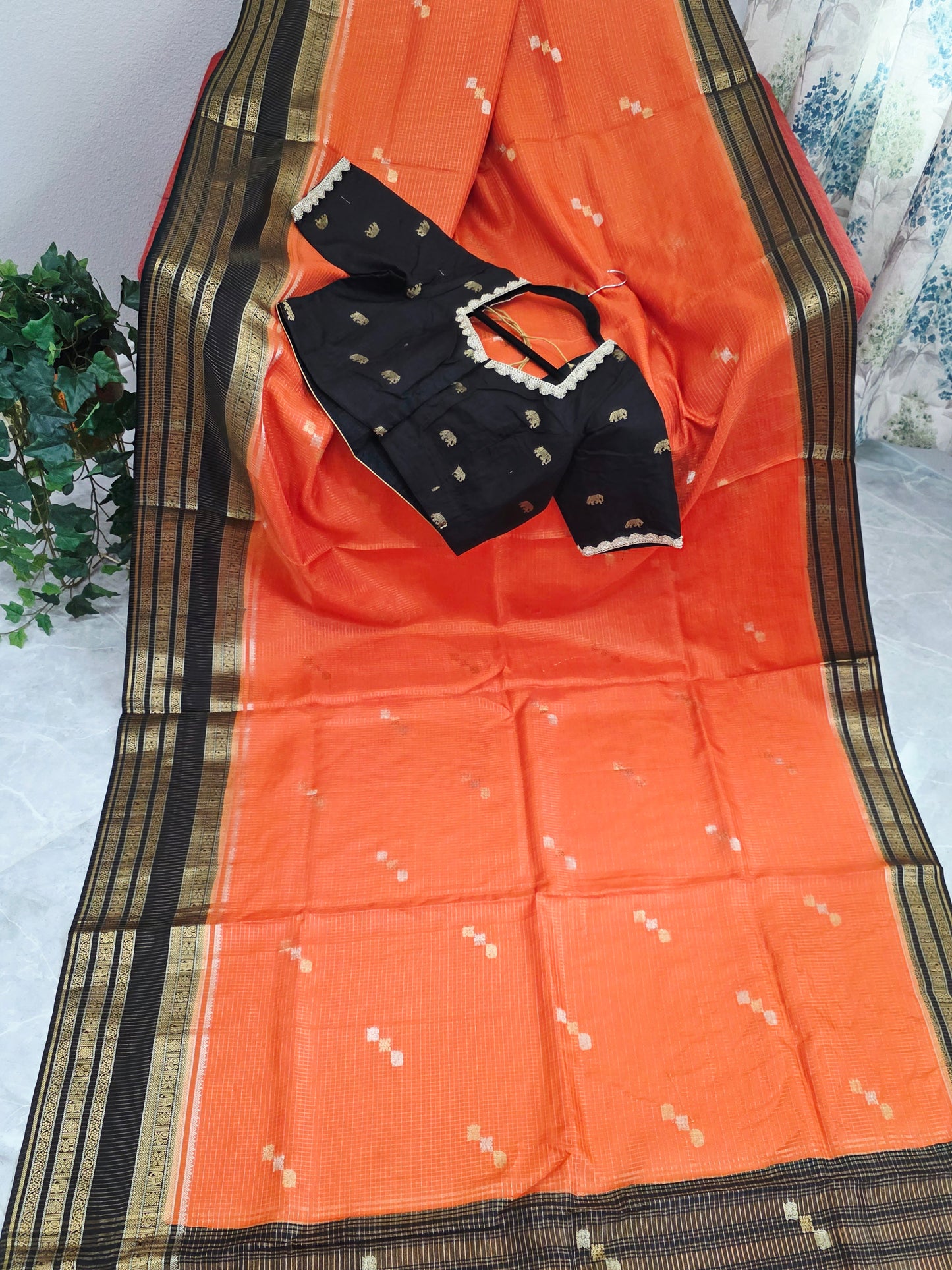 Royal Coral Orange Russian Dola Crepe Silk Saree with Black Gold Zari Border & Elephant Butta Stitched Blouse