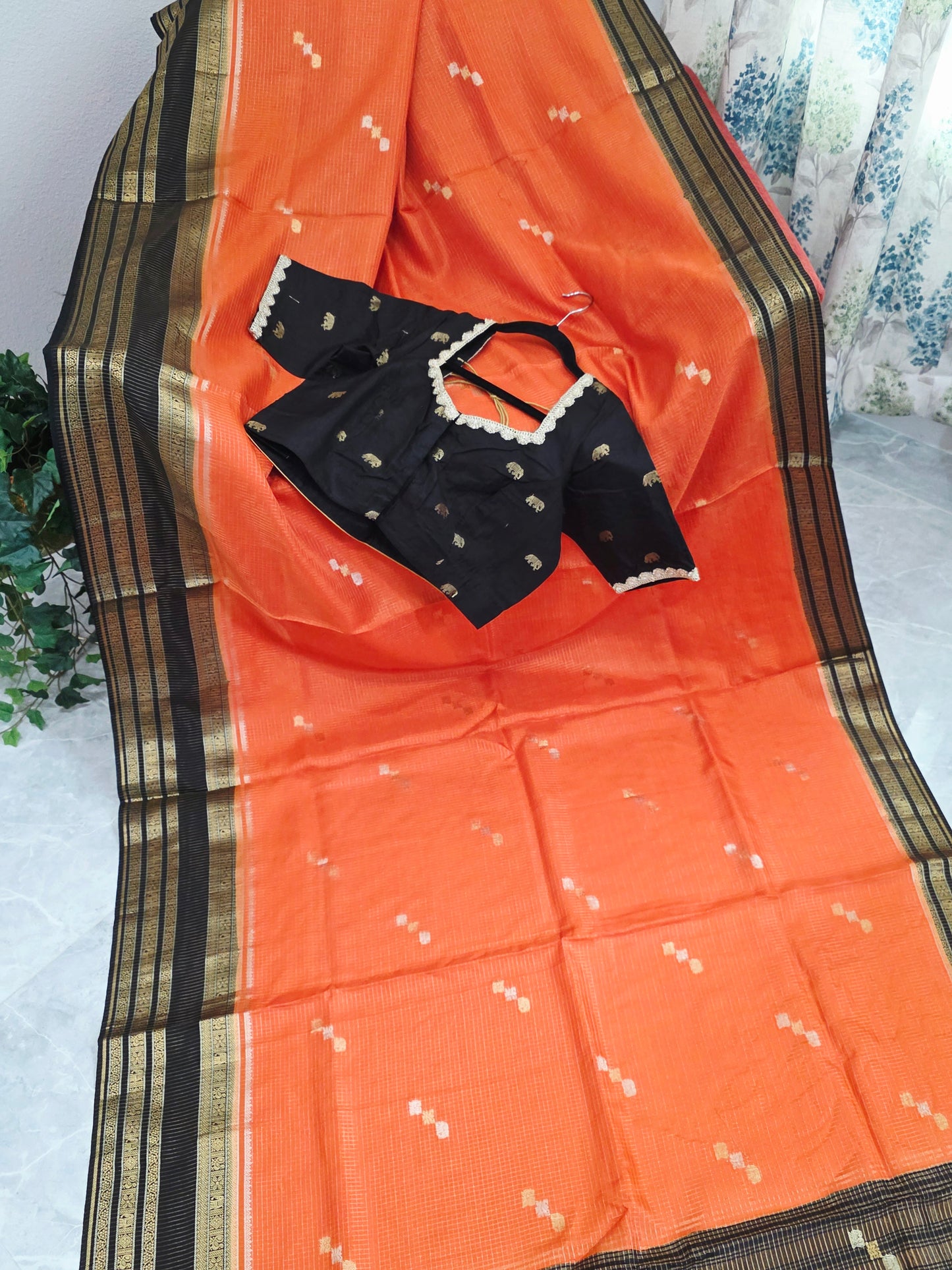Royal Coral Orange Russian Dola Crepe Silk Saree with Black Gold Zari Border & Elephant Butta Stitched Blouse