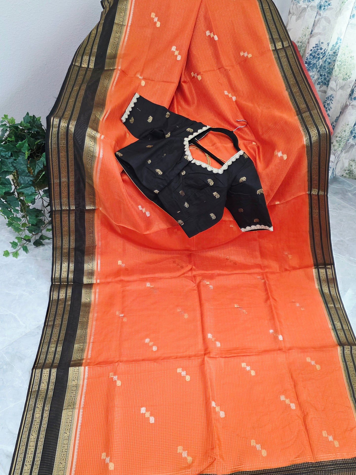 Royal Coral Orange Russian Dola Crepe Silk Saree with Black Gold Zari Border & Elephant Butta Stitched Blouse