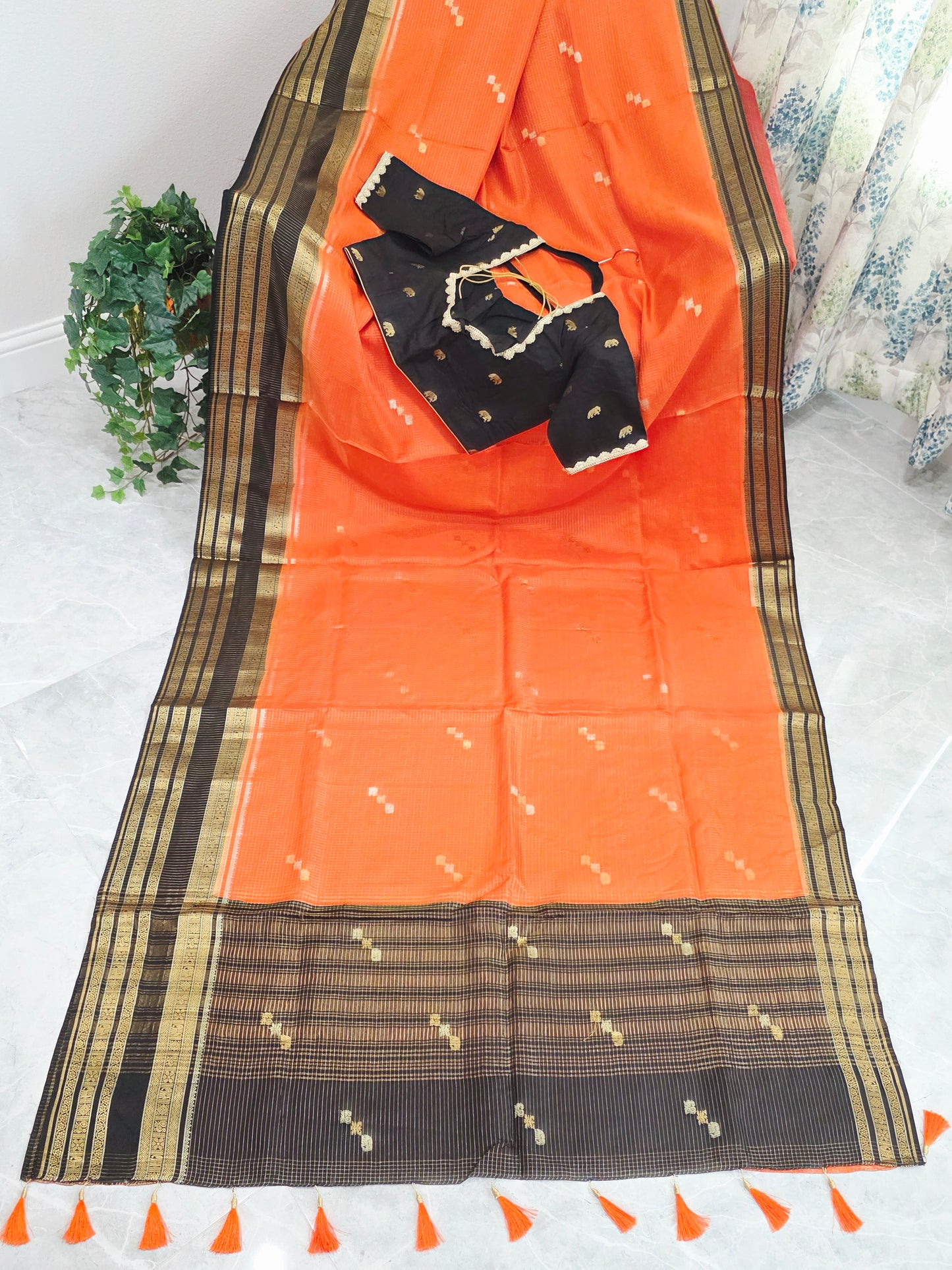 Royal Coral Orange Russian Dola Crepe Silk Saree with Black Gold Zari Border & Elephant Butta Stitched Blouse