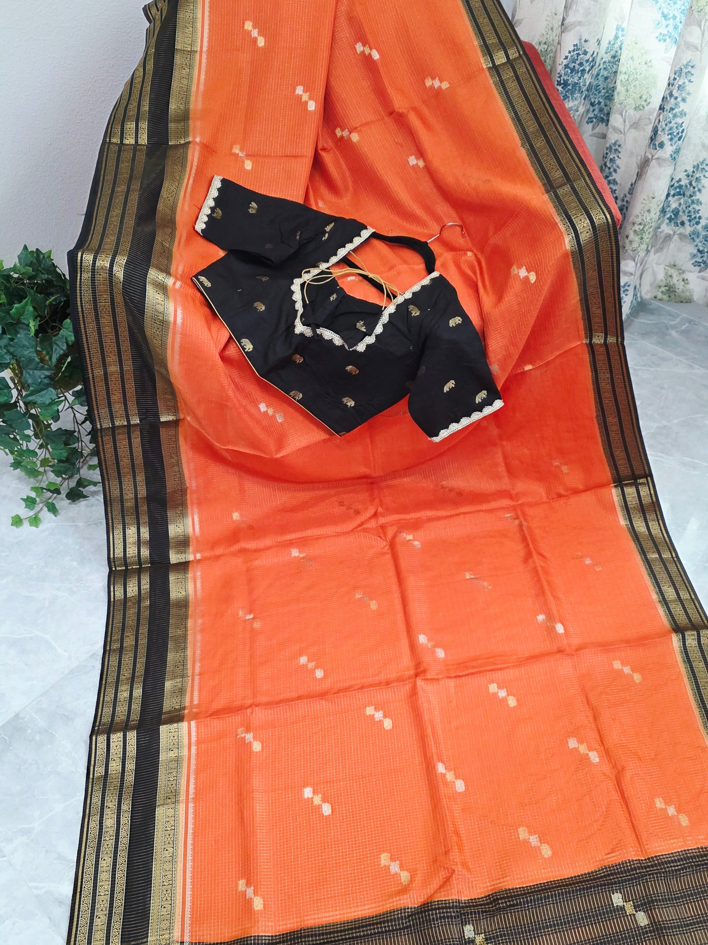 Royal Coral Orange Russian Dola Crepe Silk Saree with Black Gold Zari Border & Elephant Butta Stitched Blouse