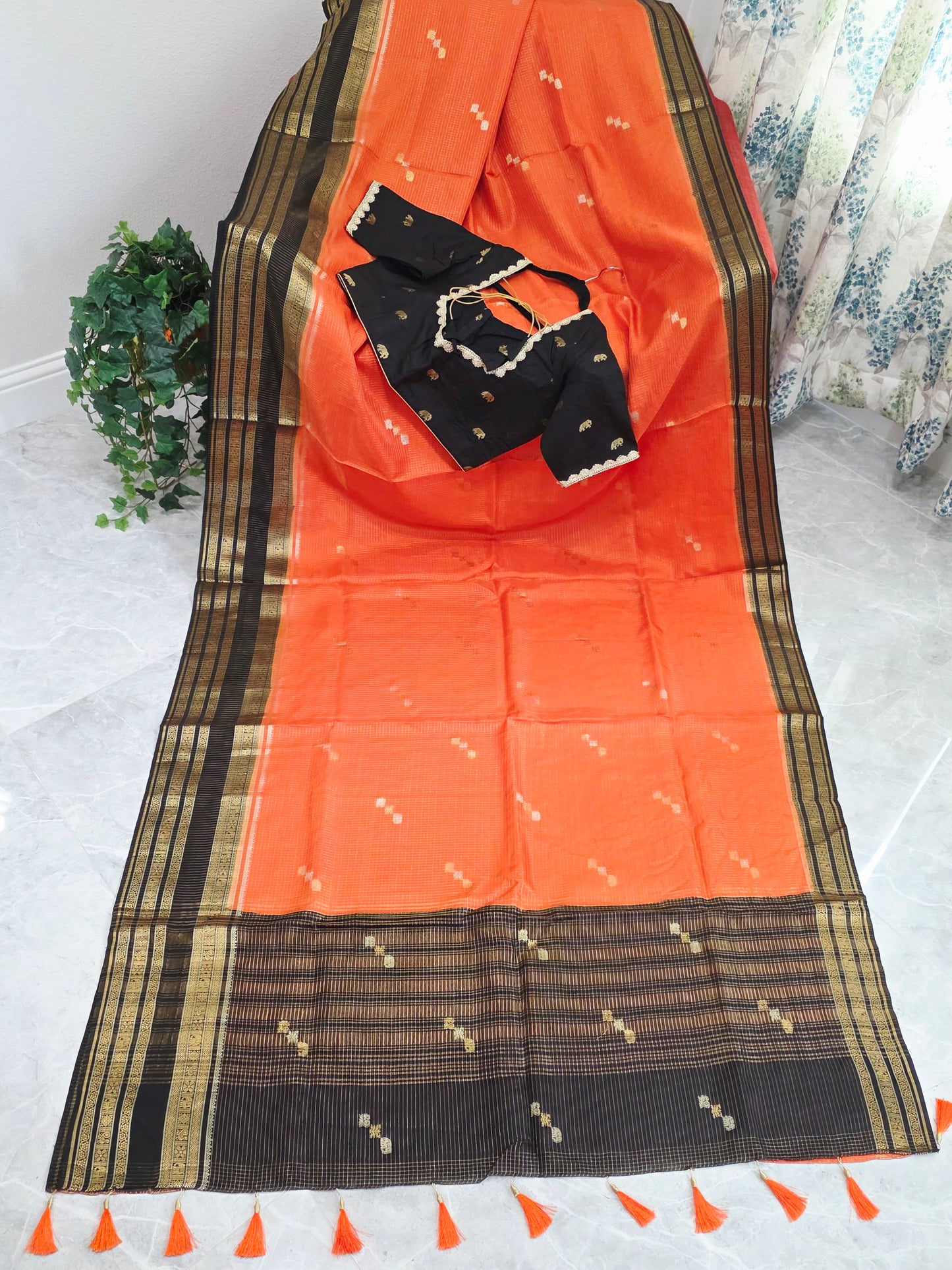 Royal Coral Orange Russian Dola Crepe Silk Saree with Black Gold Zari Border & Elephant Butta Stitched Blouse