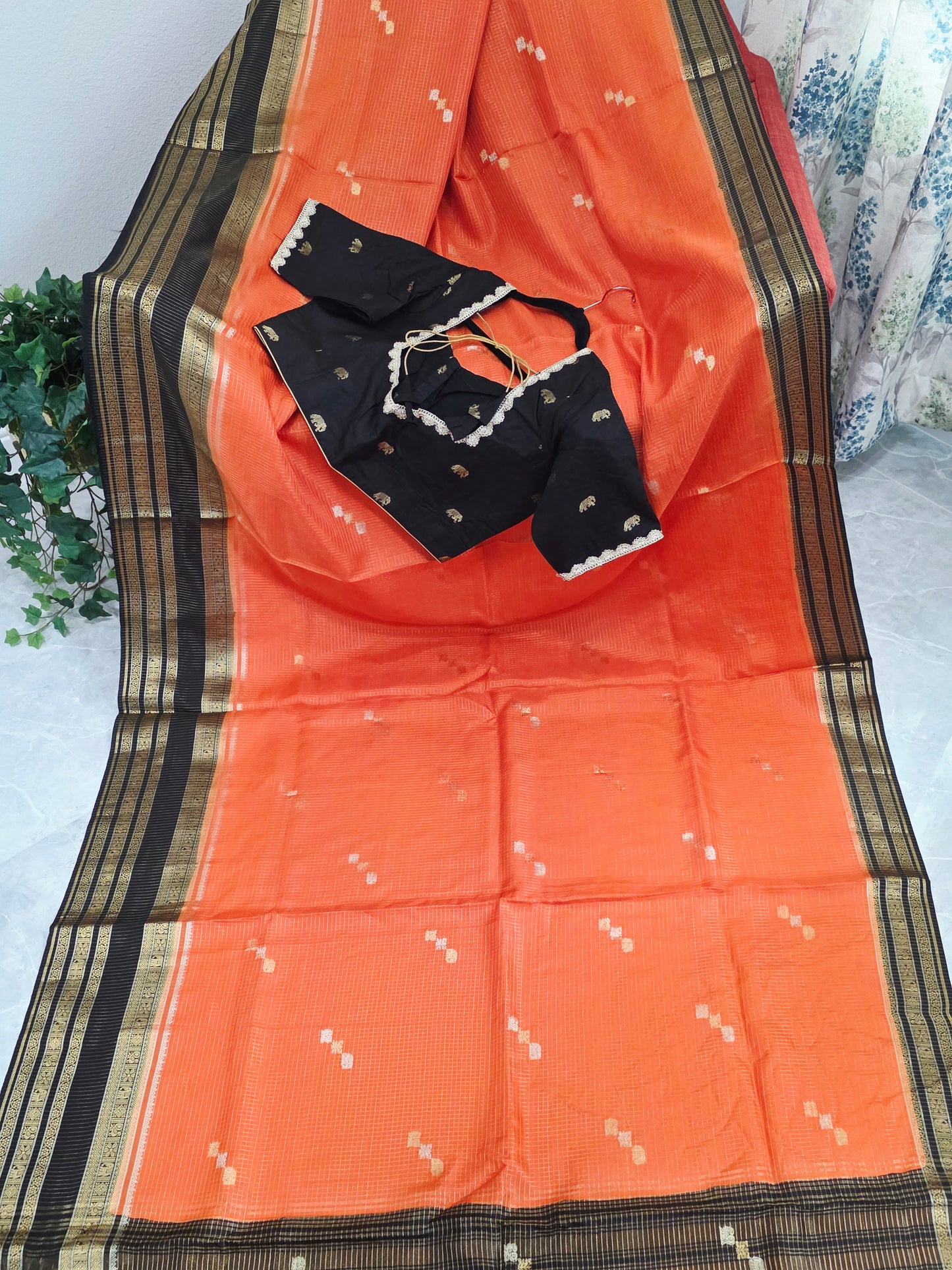 Royal Coral Orange Russian Dola Crepe Silk Saree with Black Gold Zari Border & Elephant Butta Stitched Blouse