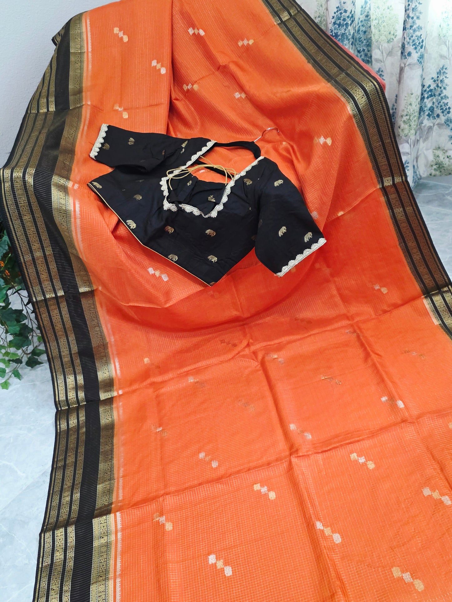 Royal Coral Orange Russian Dola Crepe Silk Saree with Black Gold Zari Border & Elephant Butta Stitched Blouse