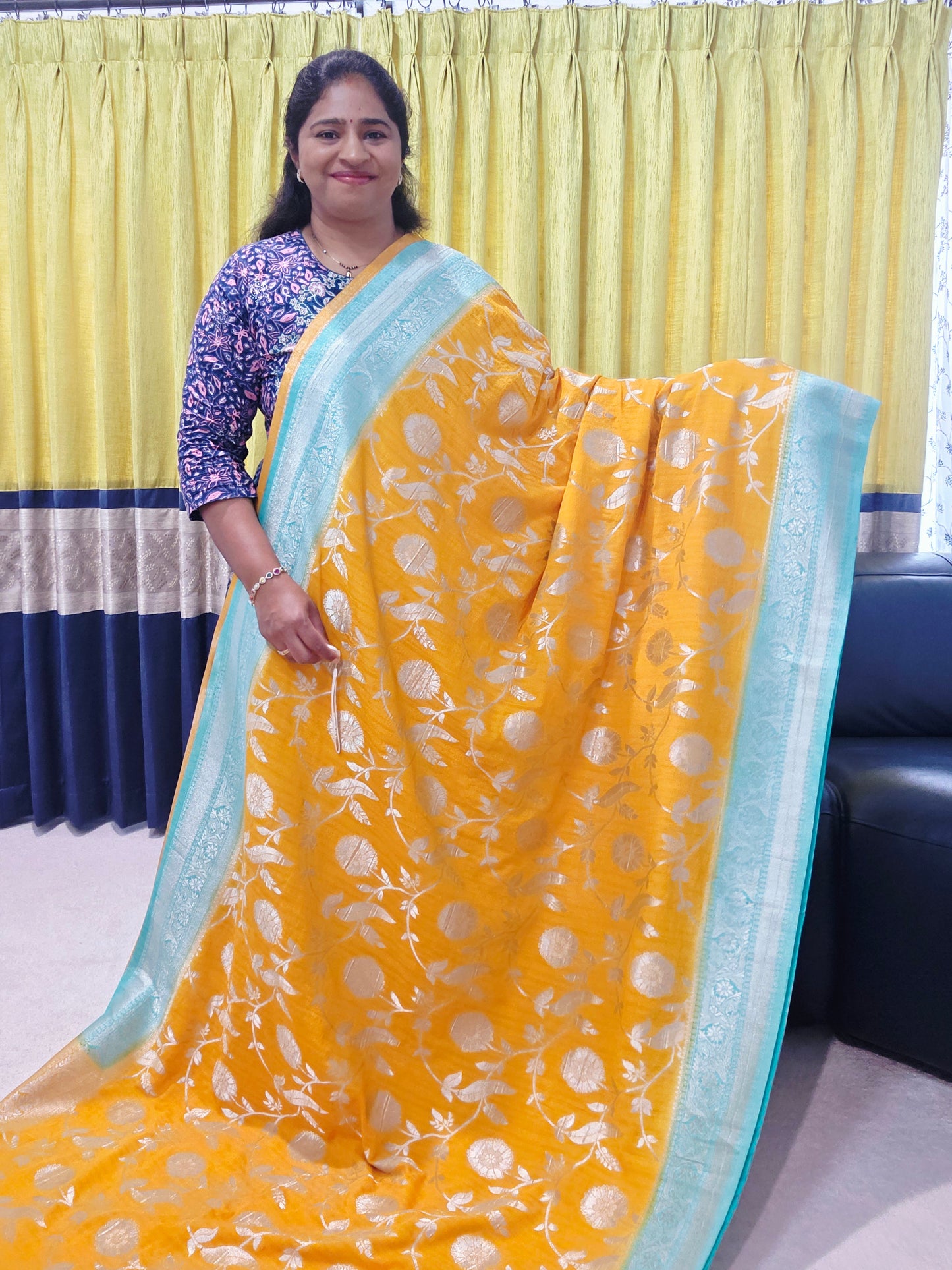 Yellow Banarasi Semi Tussar Georgette Saree with All Over Meenakari & Sea Green Border | Stitched Blouse |