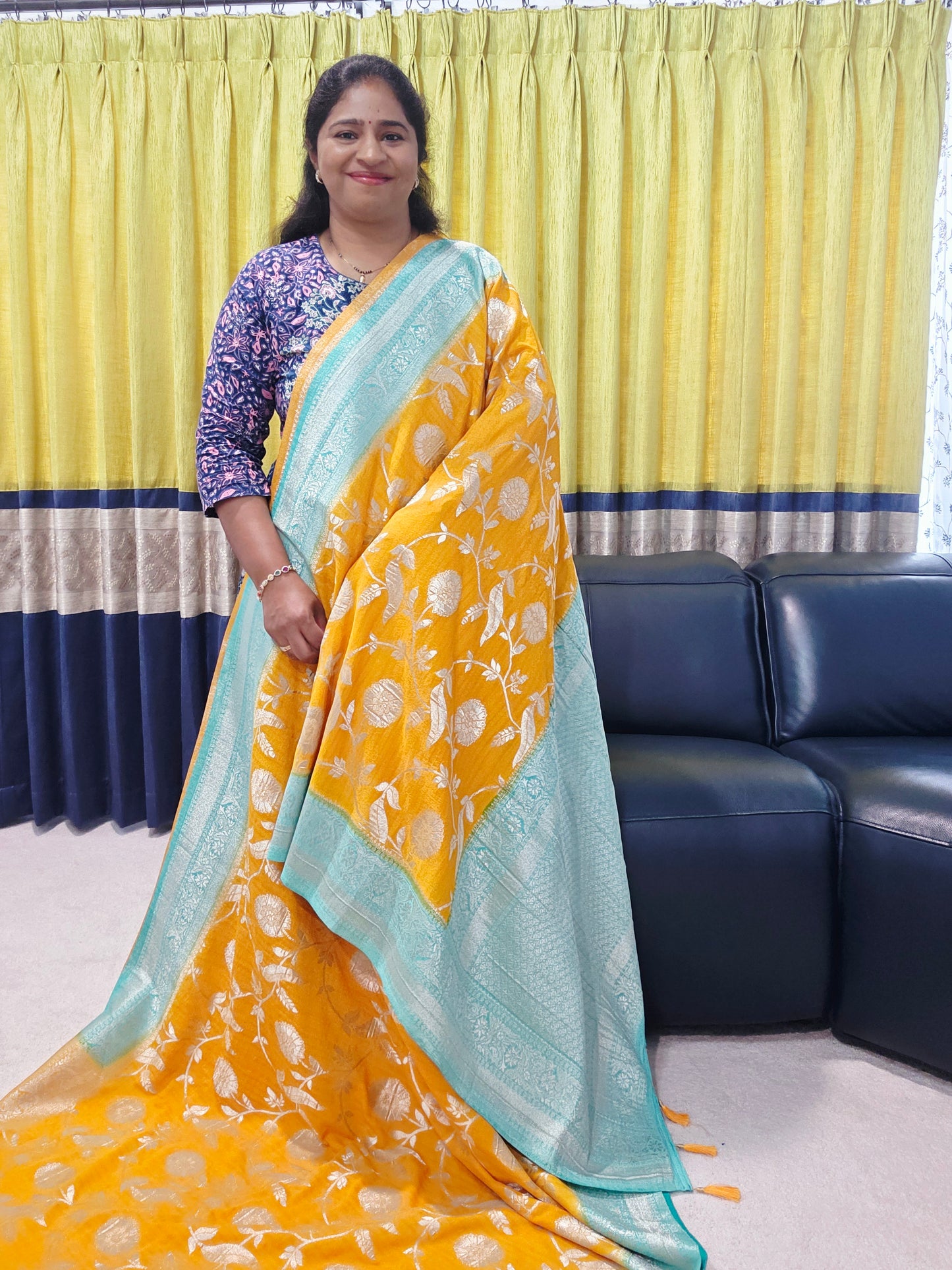Yellow Banarasi Semi Tussar Georgette Saree with All Over Meenakari & Sea Green Border | Stitched Blouse |