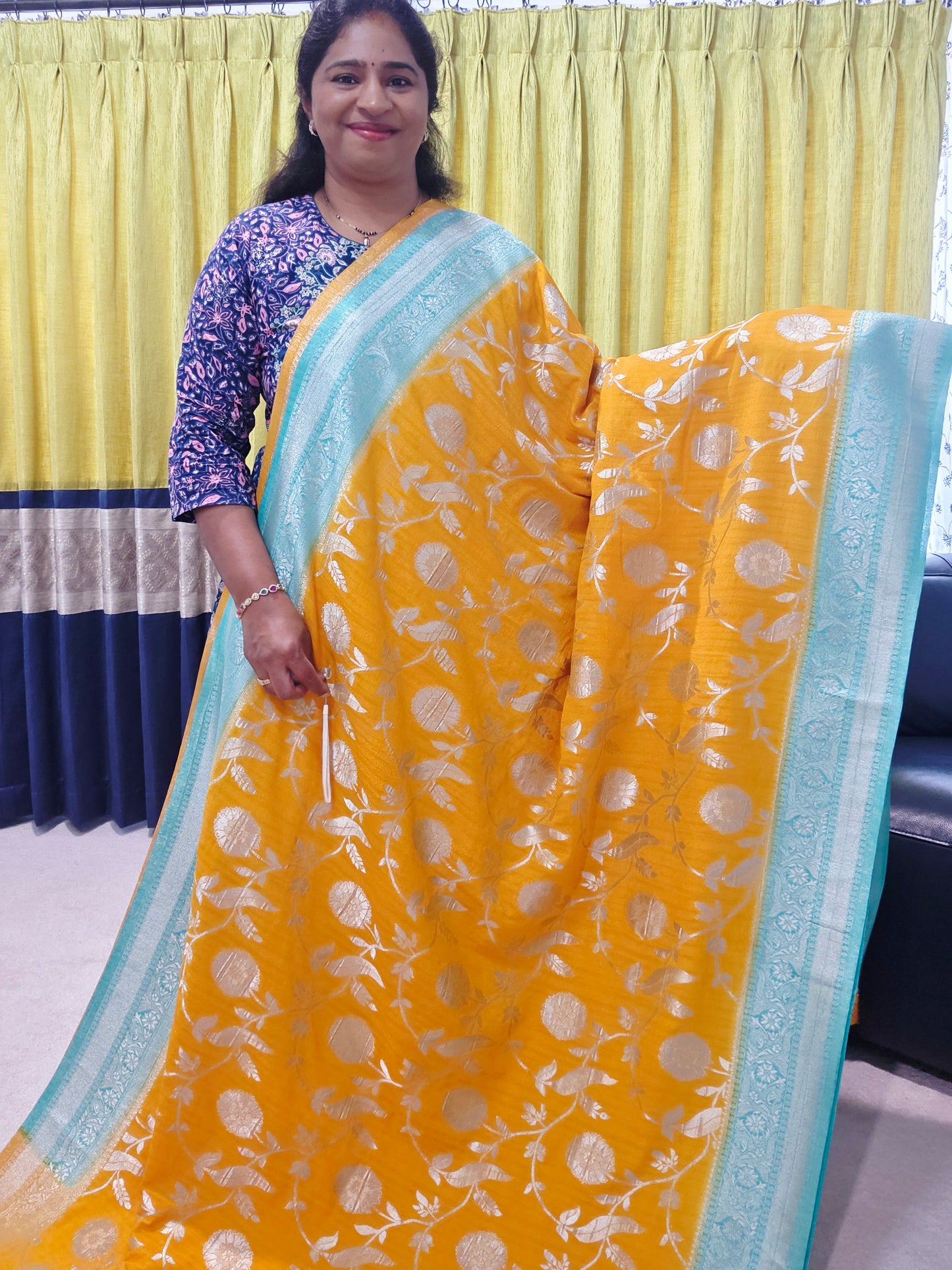 Yellow Banarasi Semi Tussar Georgette Saree with All Over Meenakari & Sea Green Border | Stitched Blouse |
