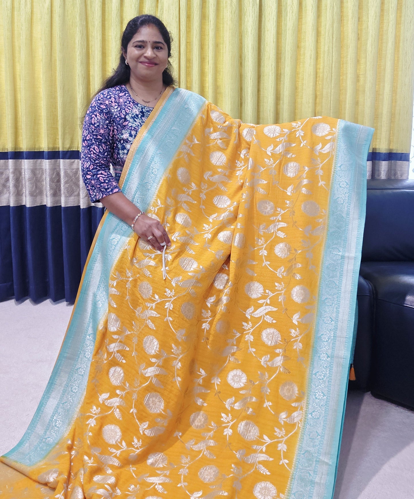 Yellow Banarasi Semi Tussar Georgette Saree with All Over Meenakari & Sea Green Border | Stitched Blouse |