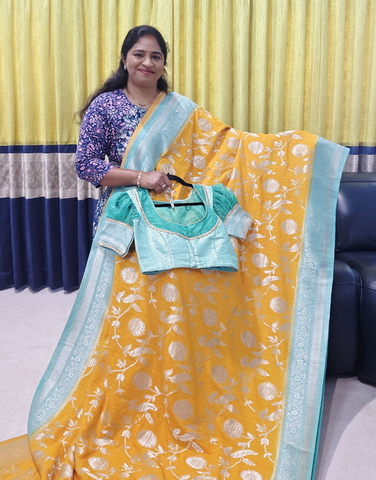 Yellow Banarasi Semi Tussar Georgette Saree with All Over Meenakari & Sea Green Border | Stitched Blouse |