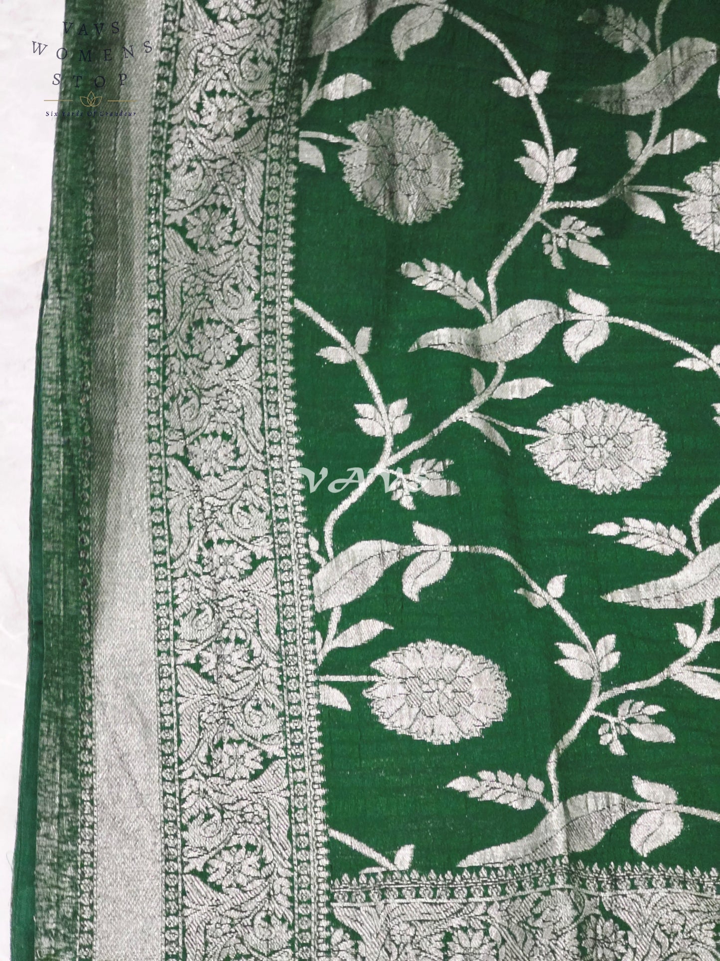 Regal Emerald Green Semi Tussar Georgette Saree with Antique Silver Meenakari Floral Weave & Stitched Blouse