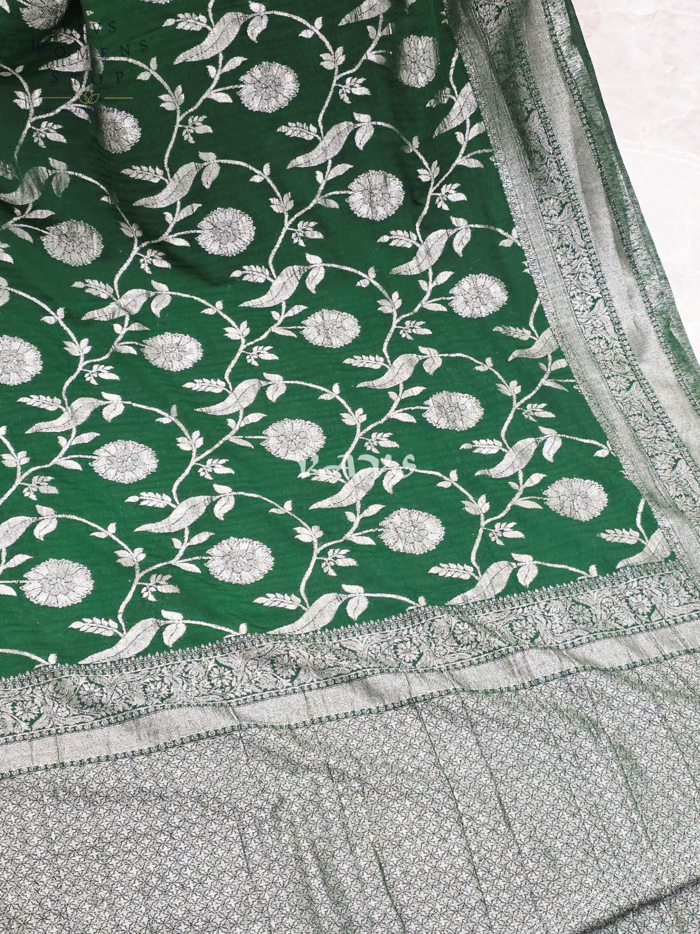 Regal Emerald Green Semi Tussar Georgette Saree with Antique Silver Meenakari Floral Weave & Stitched Blouse