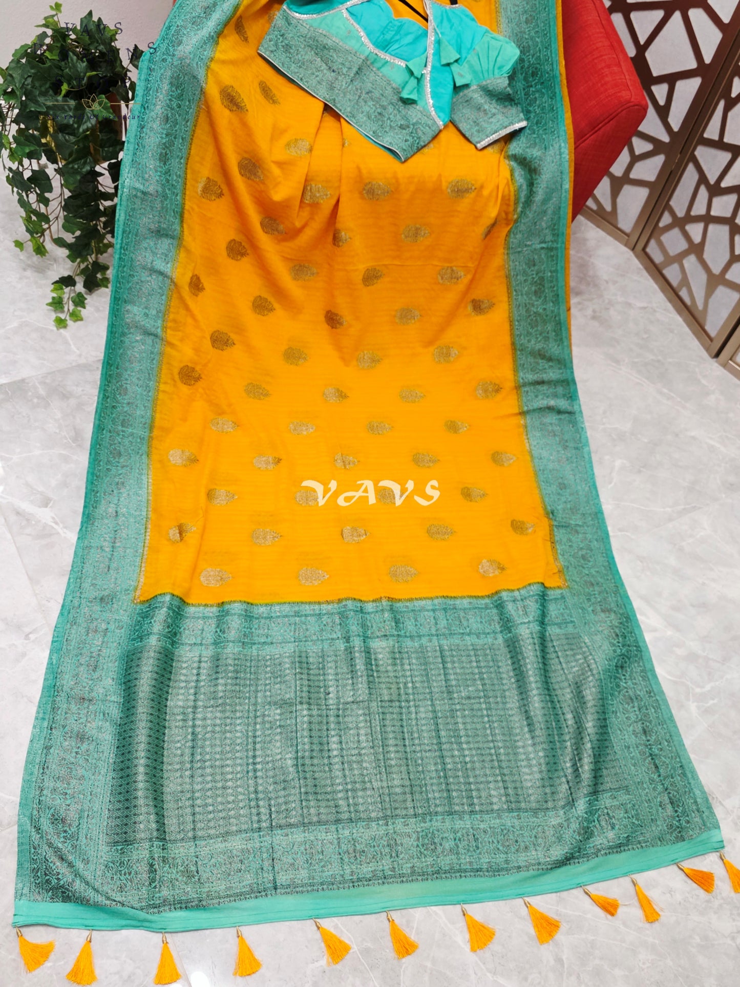 Regal Marigold & Turquoise Semi Tussar Georgette Saree with Antique Silver Zari Buttas & Puff-Sleeve Blouse