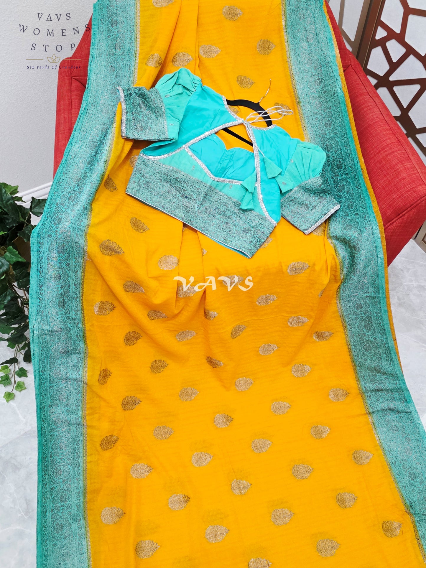 Regal Marigold & Turquoise Semi Tussar Georgette Saree with Antique Silver Zari Buttas & Puff-Sleeve Blouse