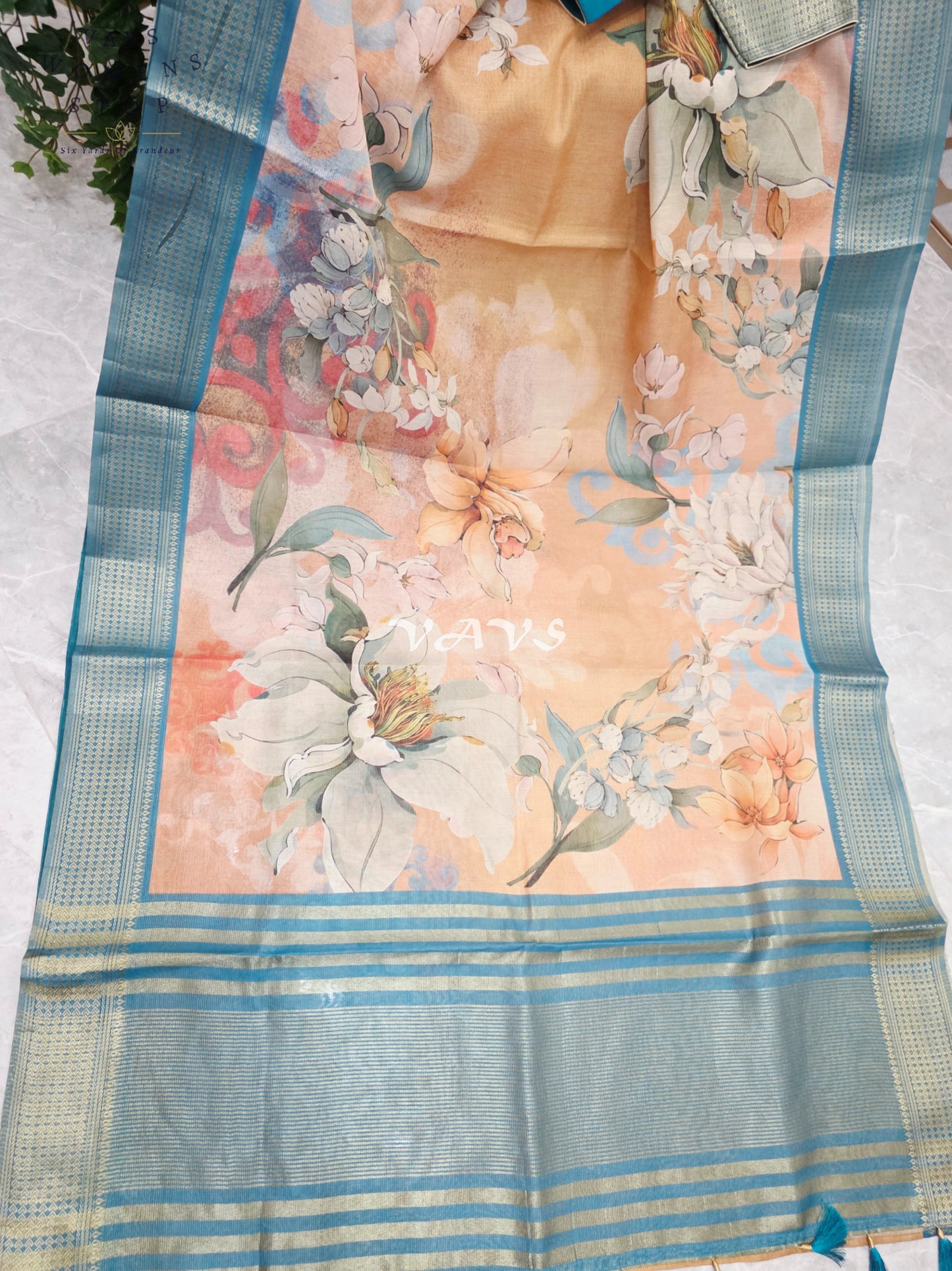 Champagne Peach Floral Print Soft Tissue Cotton Style Saree with Peacock Teal Border & Stepped Puff Blouse Size 36, Extendable to 42