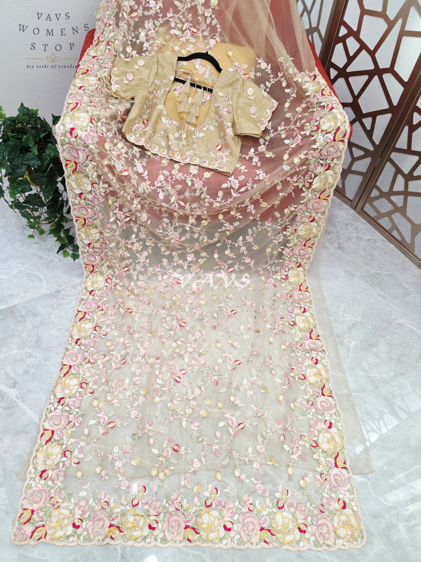 Regal Champagne Beige Soft Net Cocktail Saree with Multicolor Floral Embroidery, Stone Embellishments & Stitched Blouse Size 42–48