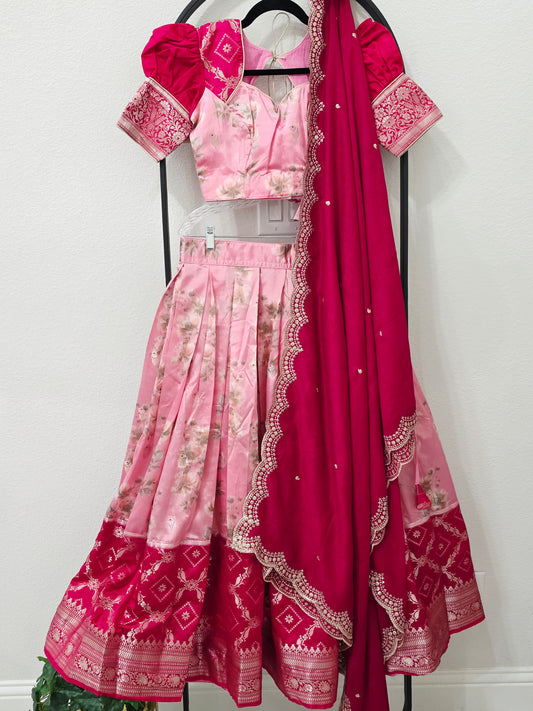 Blush Rose Pink & Rani Pink Floral Blended Benarasi Silk Lehenga Set with Light Gold Zari Brocade Border, Scalloped Embroidered Chinon Chiffon Dupatta & Designer Puff Sleeve Stitched Blouse | Size 32–38 | Juniors 11+