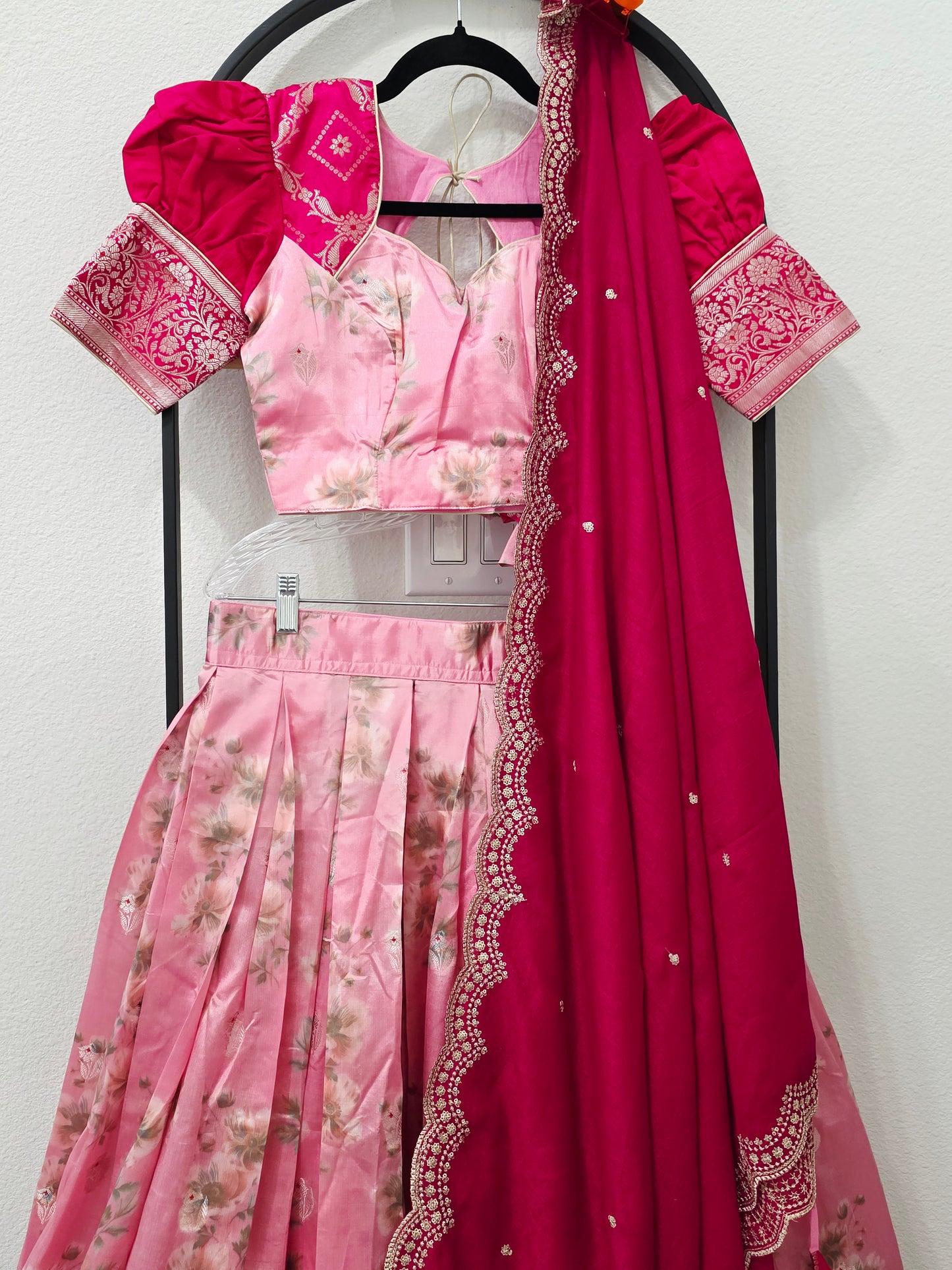 Blush Rose Pink & Rani Pink Floral Blended Benarasi Silk Lehenga Set with Light Gold Zari Brocade Border, Scalloped Embroidered Chinon Chiffon Dupatta & Designer Puff Sleeve Stitched Blouse | Size 32–38 | Juniors 11+